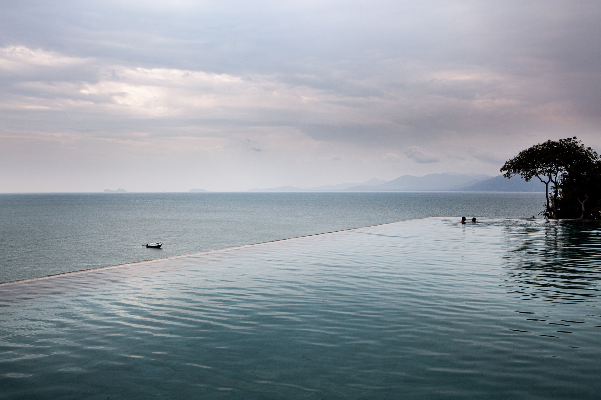 Fisherman and infinity pool