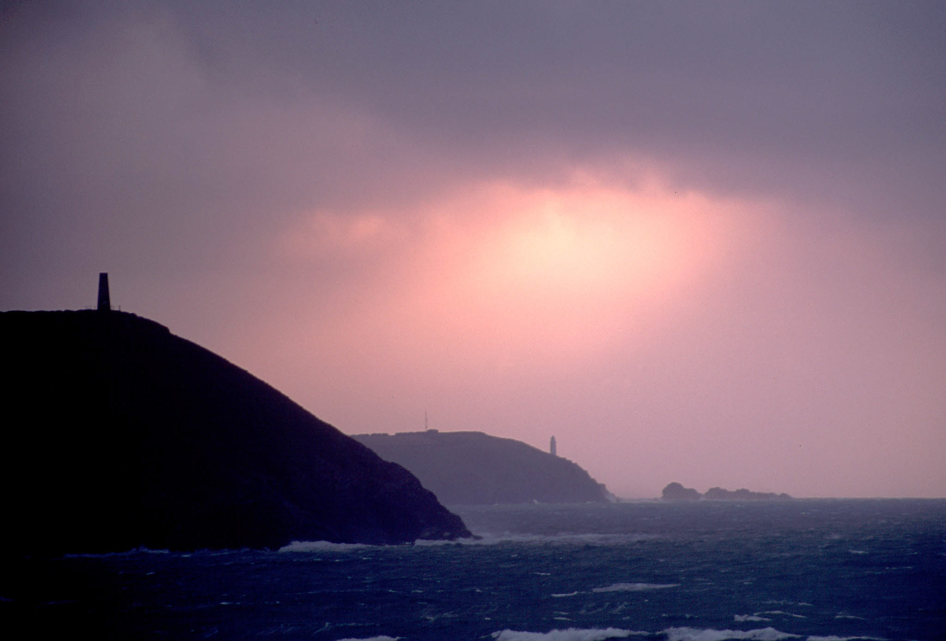 STEPPER POINT SUNSET STORM. An original photograph by Chris Rose. Image size: 31cm x 46cm. Frame size: 56cm x 77cm. FOR SALE £85