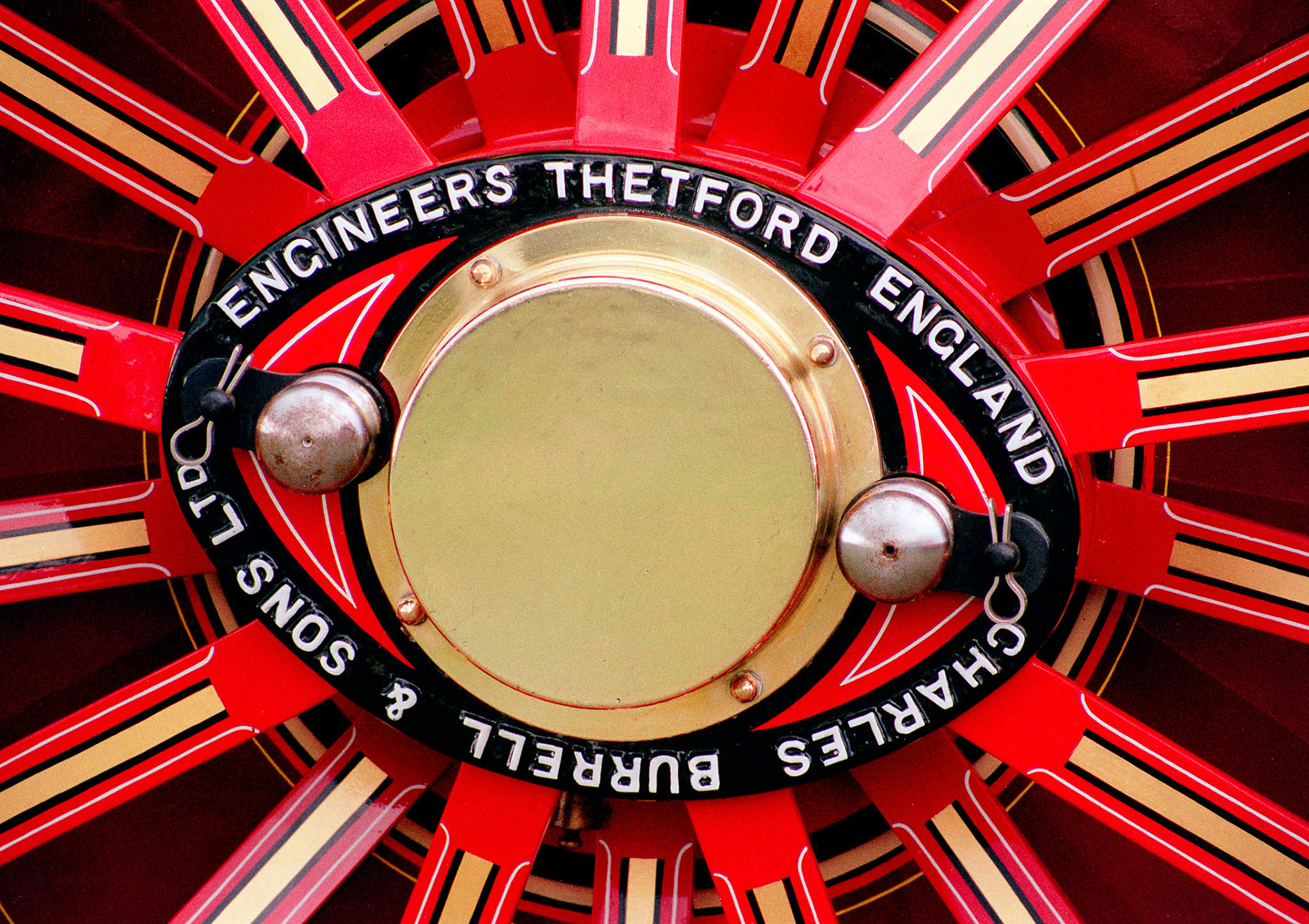 CHARLES BURRELL TRACTION ENGINE WHEEL. An original photograph by Chris Rose. Image size: 20cm x 29cm. Mount size: 30cm x 40cm. FOR SALE £19.