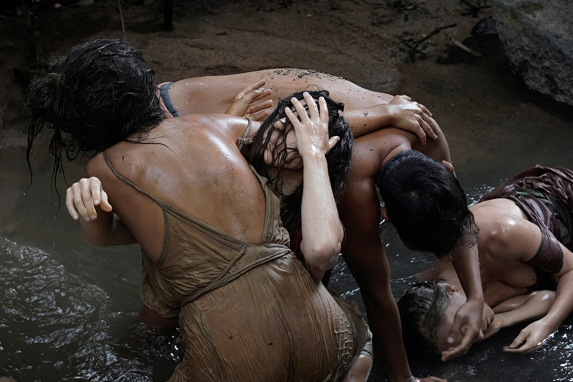 Embodied improvisation in tropical landscape, captured photographically with chiaroscuro and Baroque aesthetics.