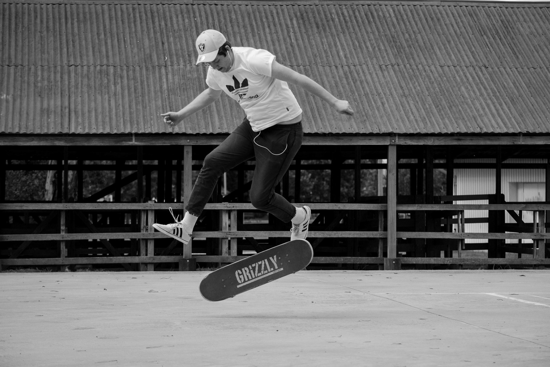 Skateboarder in progress of tree flip