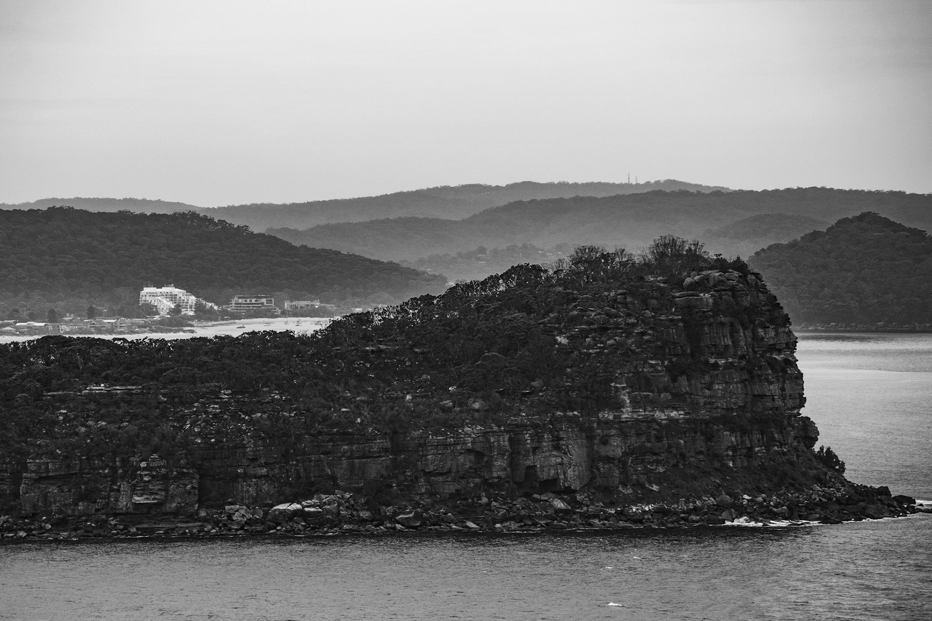 Lion Island with hills in distance