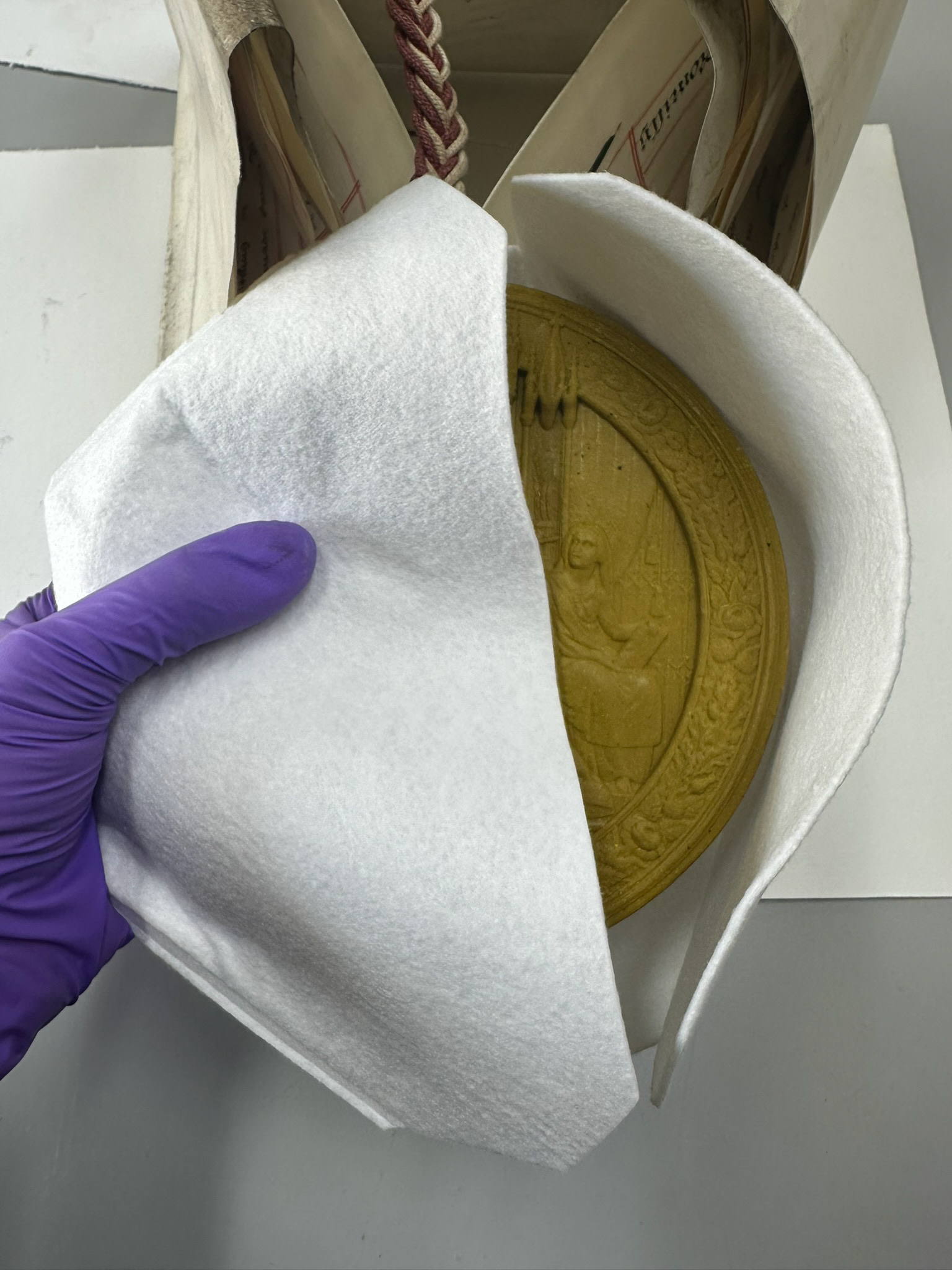 Great Seal of Queen Victoria rehoused into a cushioned archival pocket. © Wyszomirska-Noga