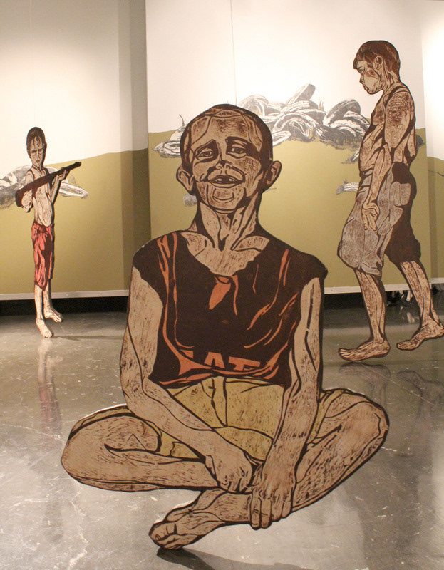 Up Like Weed (installation view) 2012, figures are relief print collaged on woodcut matrix, approx. 60in x 36in each