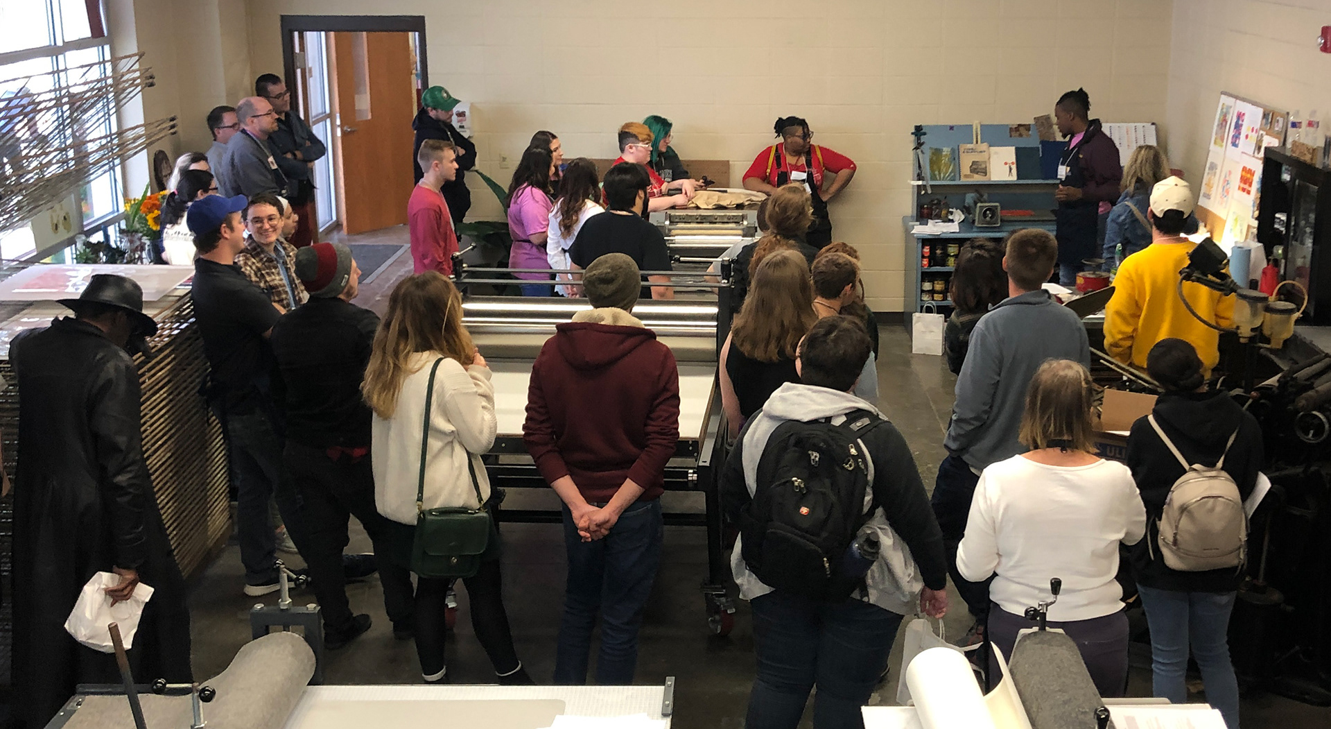 Nicholls State University students demo photopolymer plate printing during Print Thing 7 at BRCC