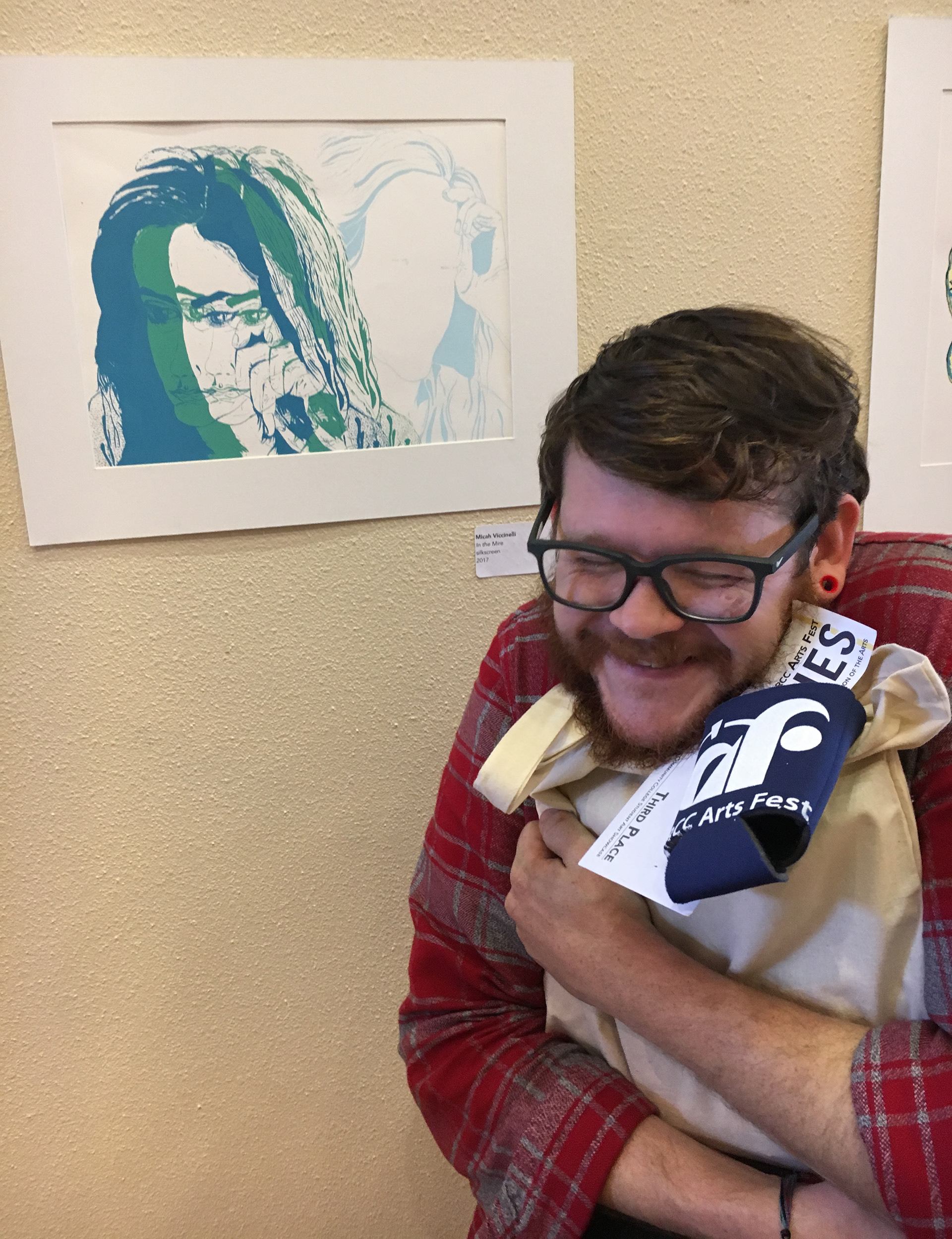 Micah Viccinelli's reaction to his print placing at the Student Art Showcase during BRCC Arts Fest 2017