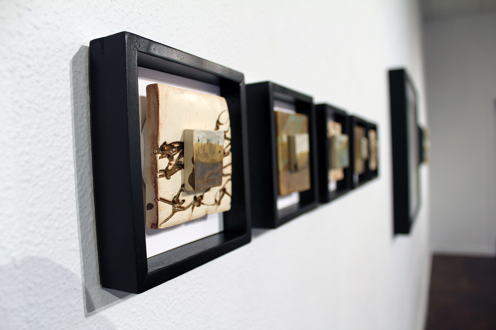 Dislocations III (gallery view), 2019, relief printed porcelain, 5– 6in x 6in,
