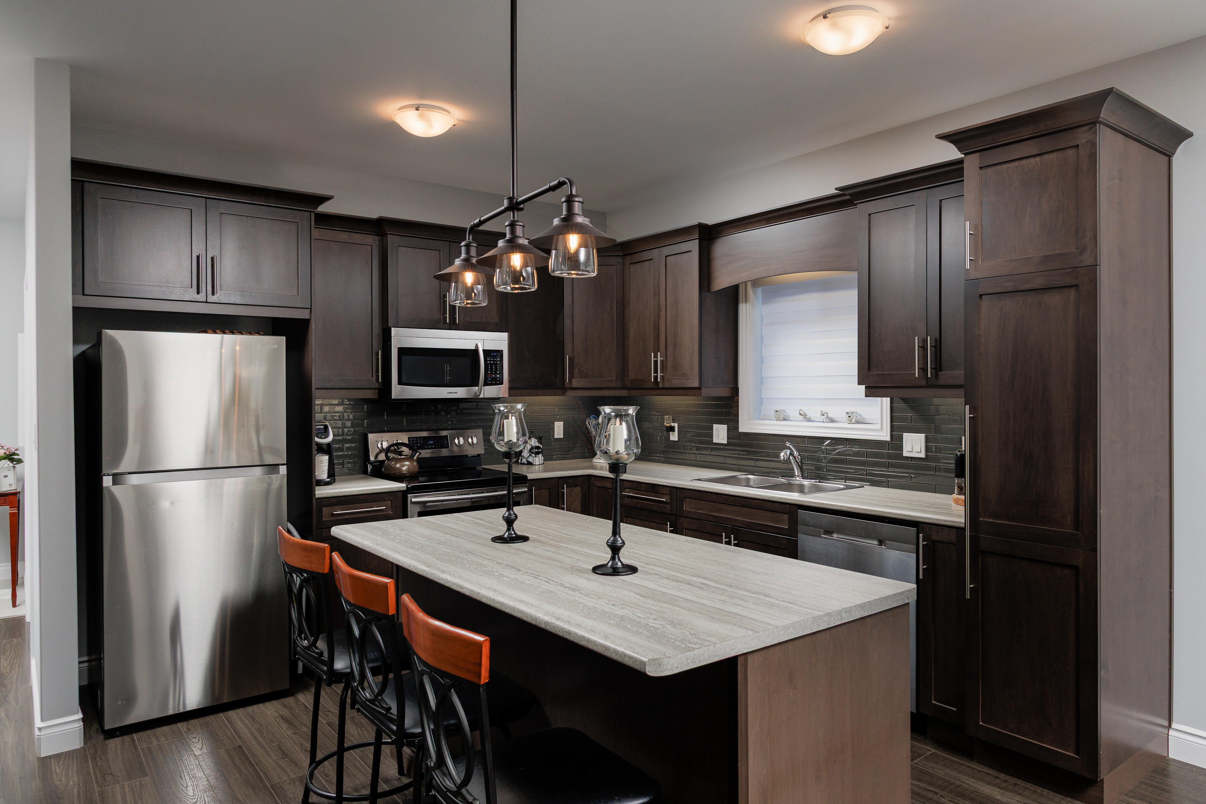 Elegant kitchen showcasing clean lines, premium finishes, and a bright, open layout.