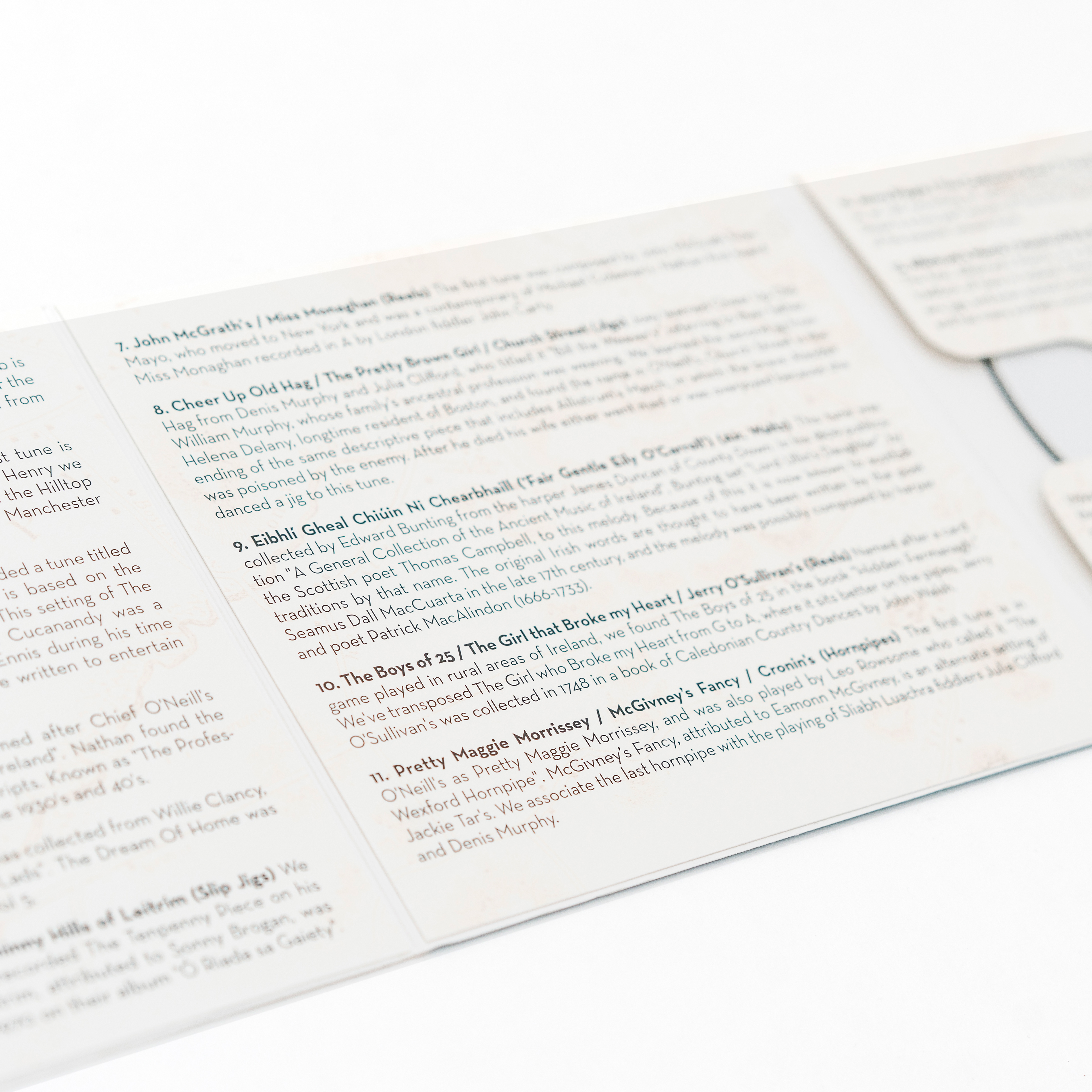 Nathan Gourley and Joey Abarta's "Copley Street." Joey and Nathan commissioned an original paper cut of their house on Copley Street, which we scanned and colored for the cover of this album, giving it a homemade feel. I used an antique map of their neighborhood in Boston as a background image for the liner notes inside.