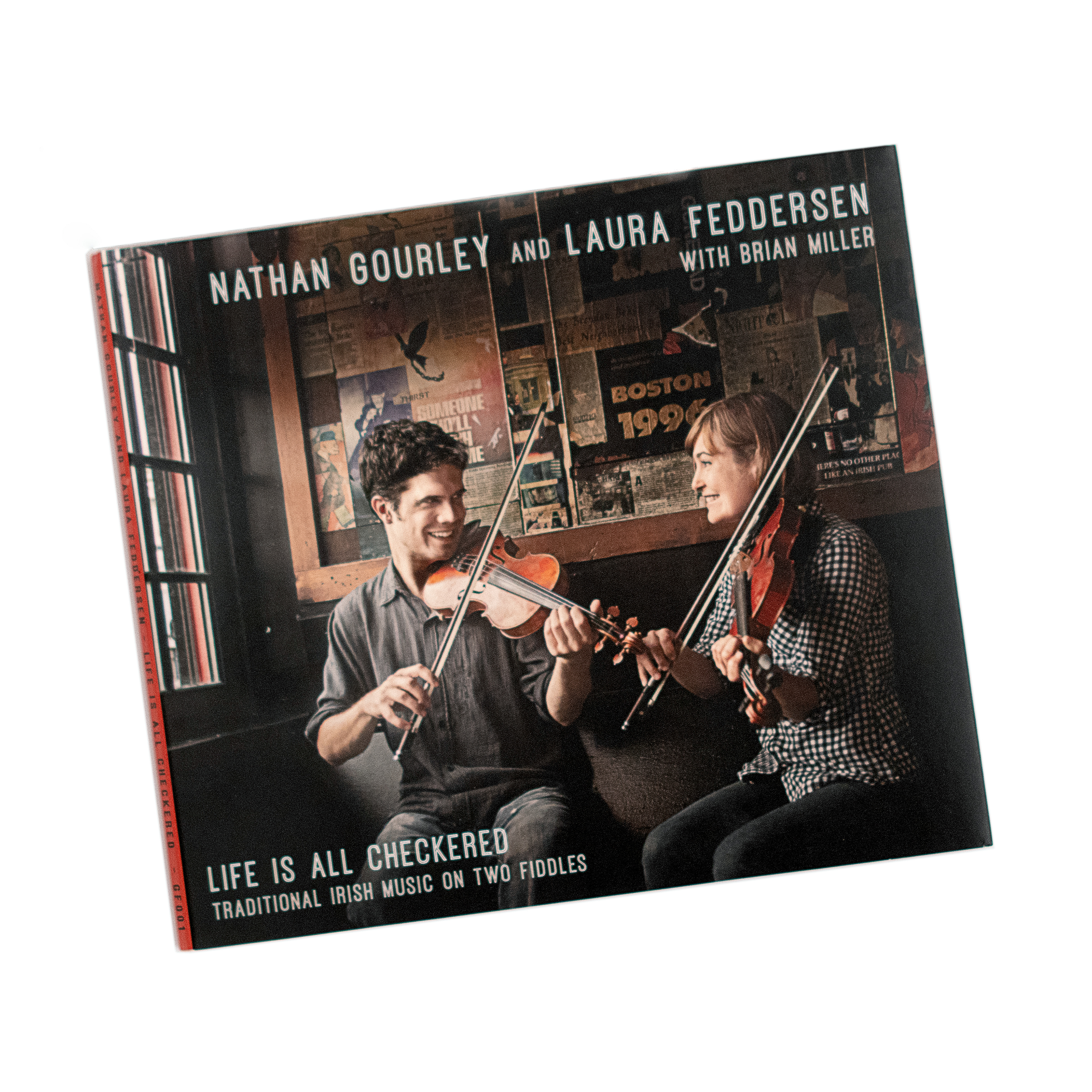 Nathan Gourley and Laura Feddersen's "Life is all Checkered." This design has a comfortable and homey feel about it, and in fact all the imagery was created within one city block of Laura and Nathan's home, where it was recorded. The checkerboard pattern in the liner notes and on the disc was hand-drawn by Laura, which adds an organic touch.