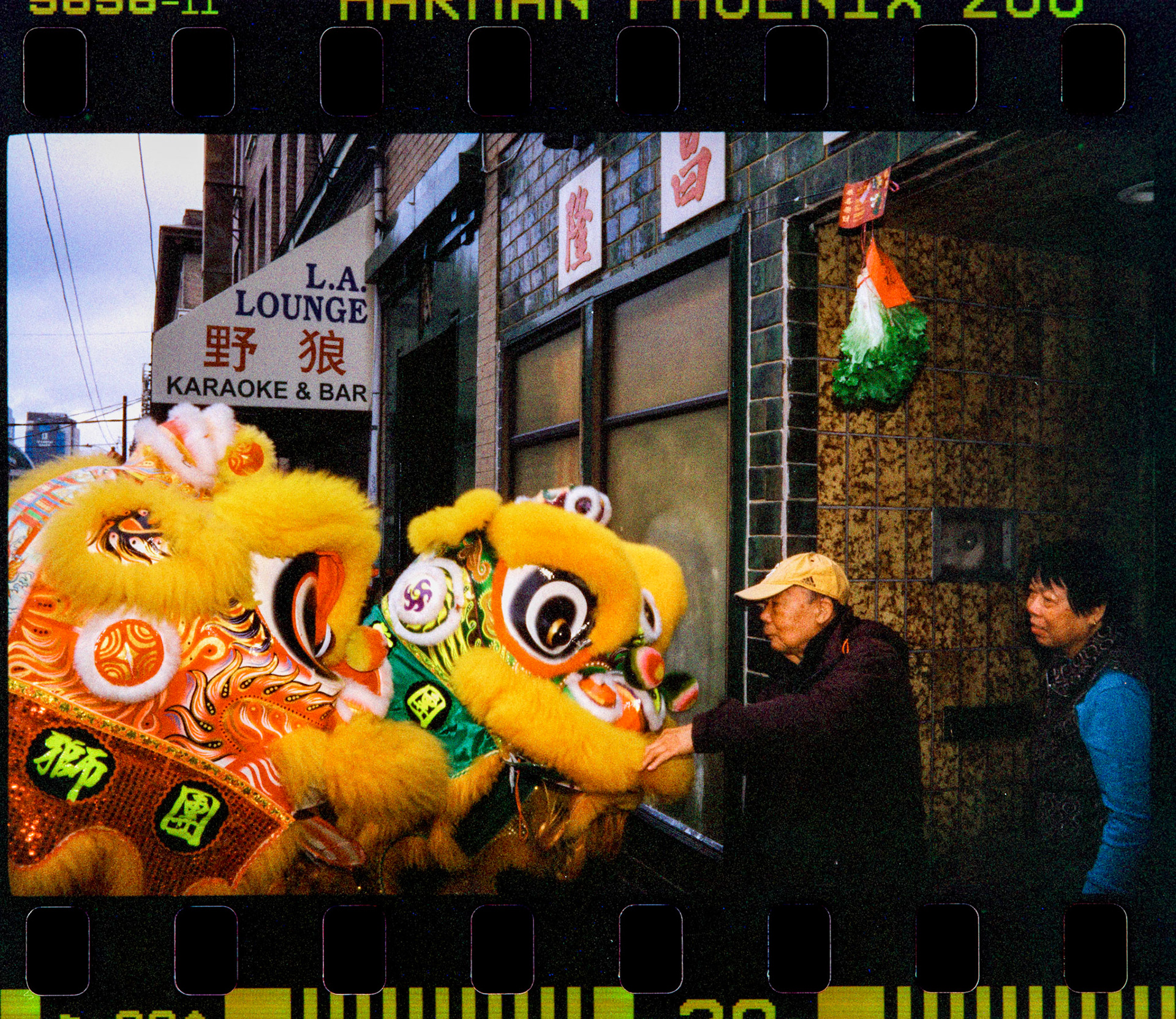 Seattle. WA, USA.February 2024.Chinese New Year in Seattle International District.Harman Phoenix 200. Leica MP, Leica 35mm f1.4 Summilux.