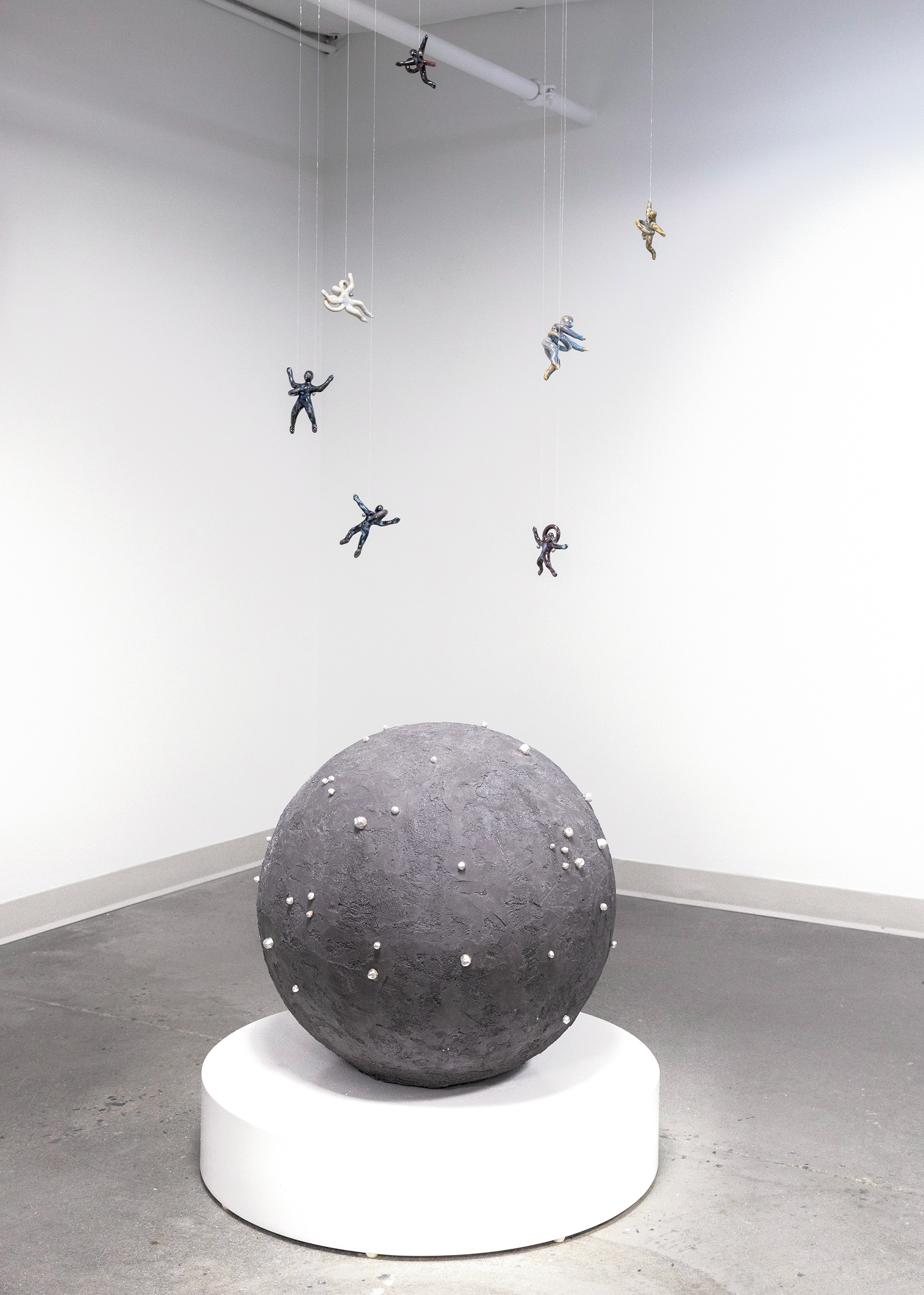 Cosmic Implant, (2024) Approx. 33 x 33 x 33 in.  Concrete, Epoxy, Ceramic Silver Leaf, Installation