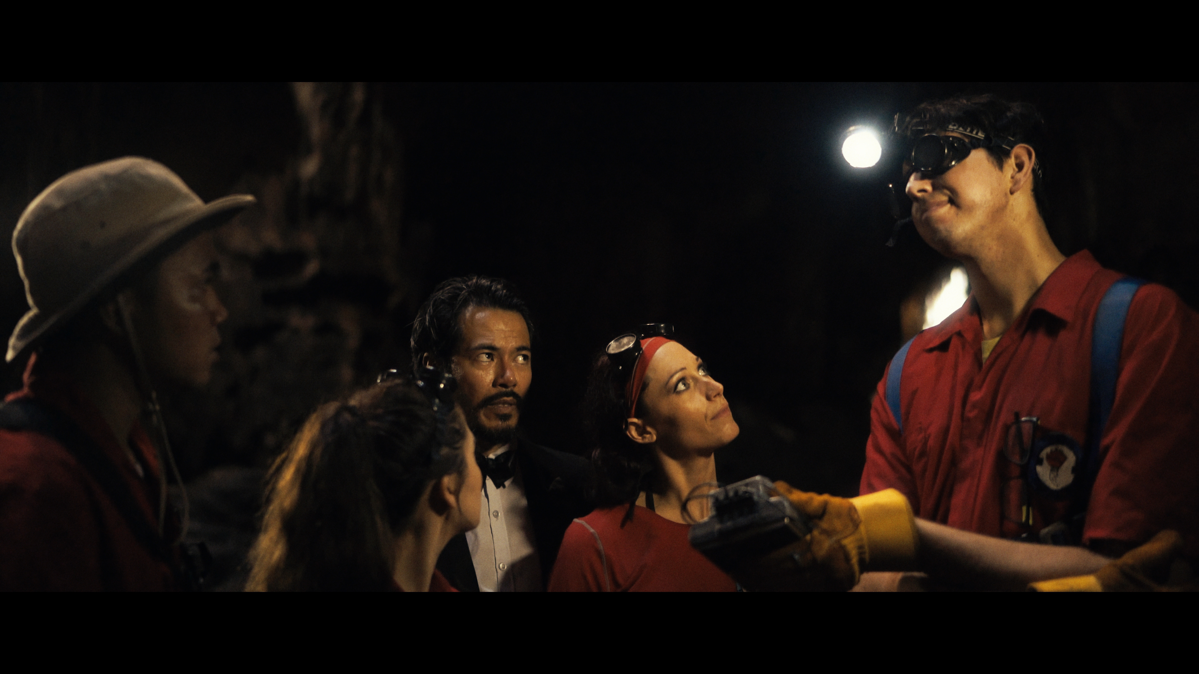 The team explores a mysterious cave.