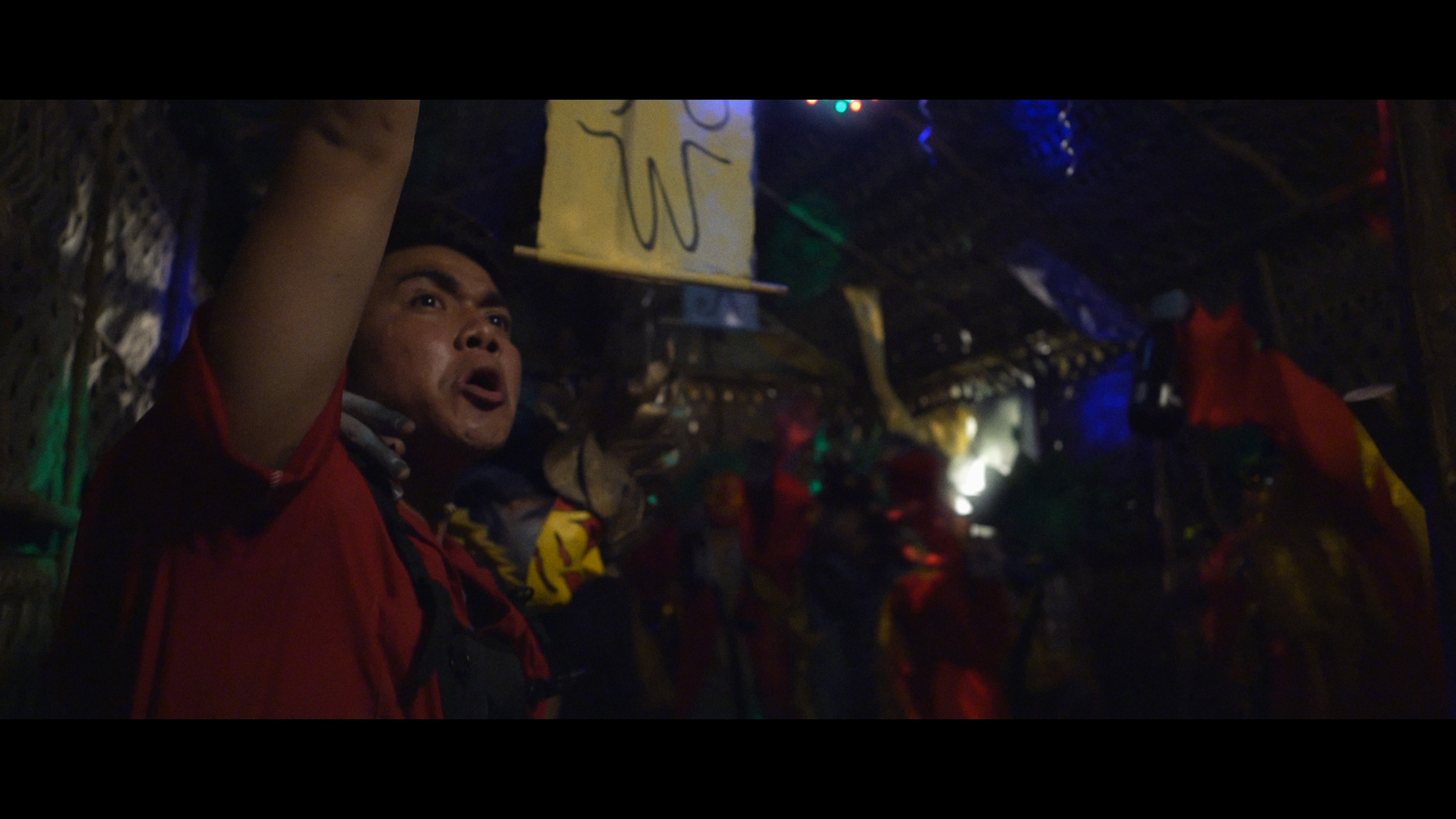 Benito (Leonard Olaer) does his best to celebrate.