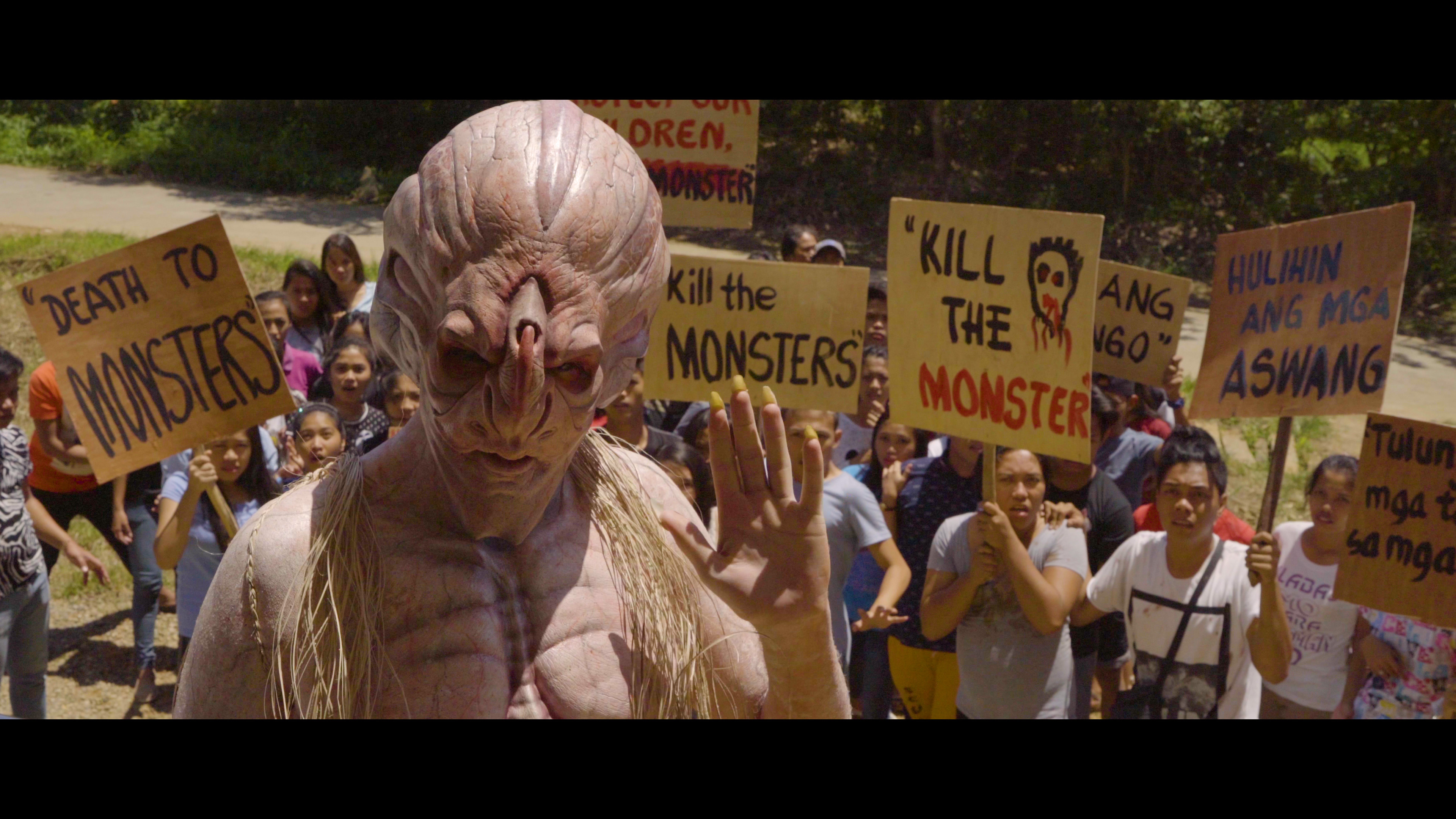 Nameless towers over the crowd.