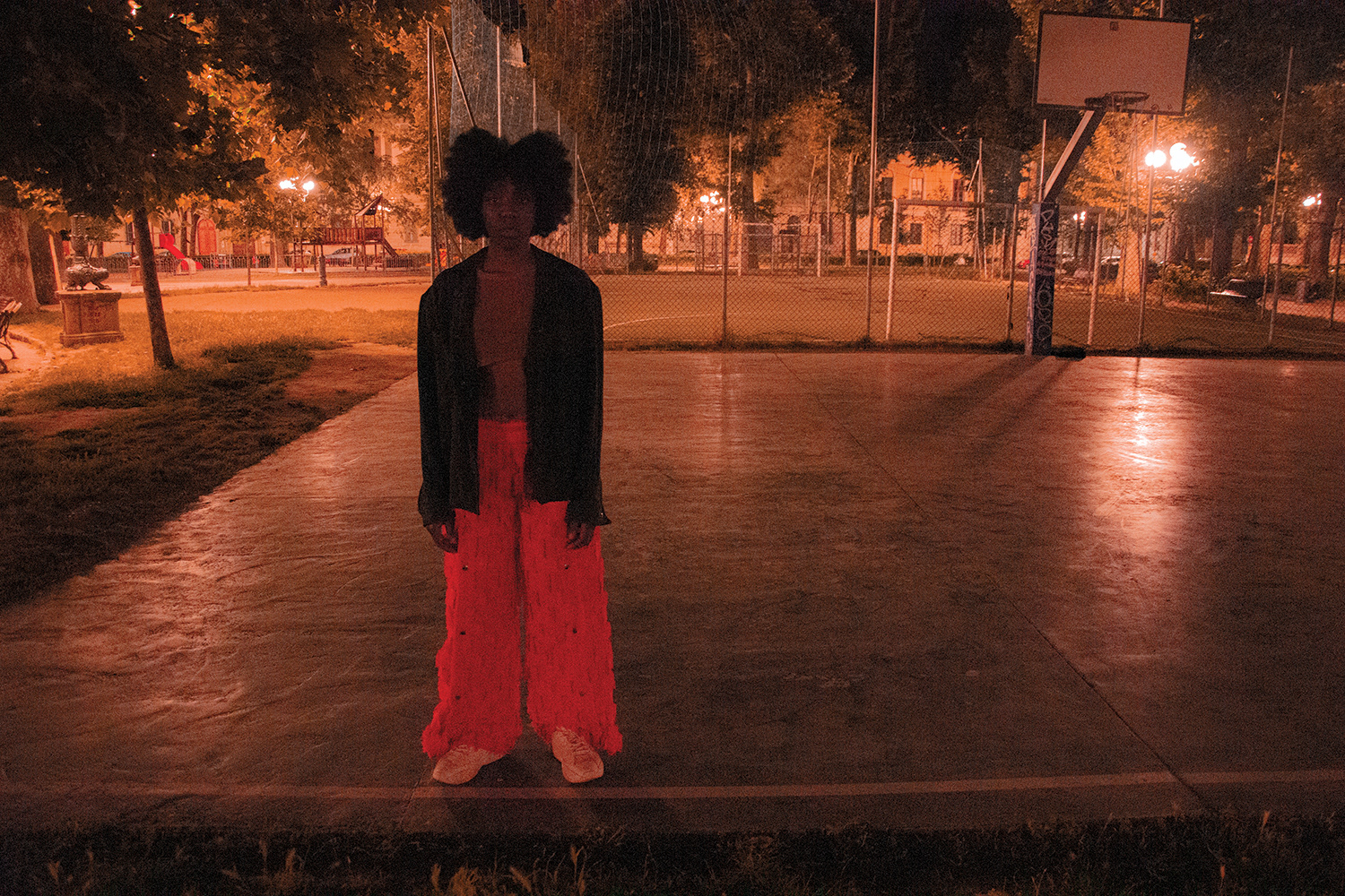 LOOK 1 - TEAR OFF PANTS, ASYMMETRICAL TANK TOP AND WARM-UP SHIRT