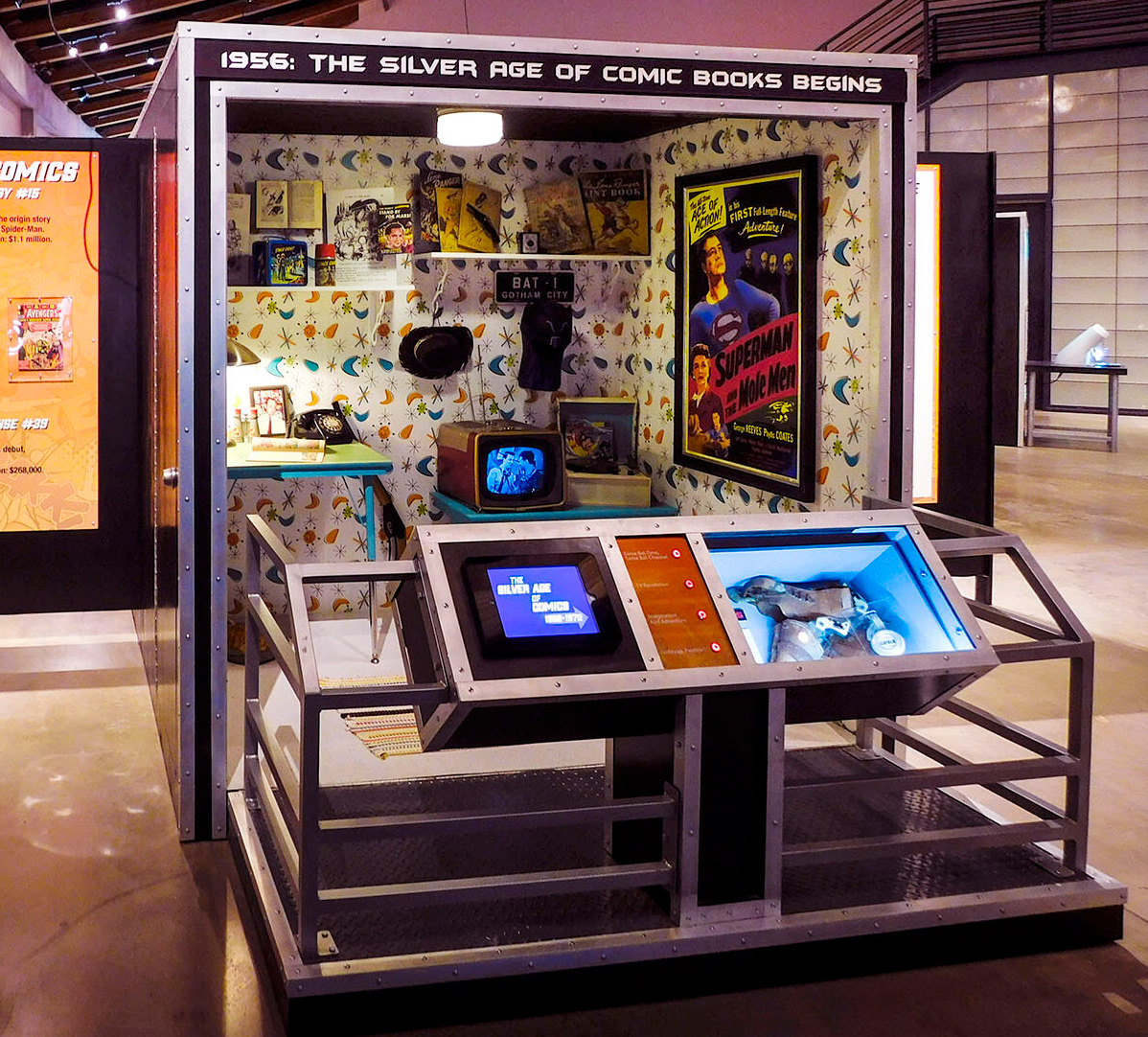 I hid a 19" flat panel TV inside the period cabinet by mounting it vertically and hiding the bottom behind the table frame.