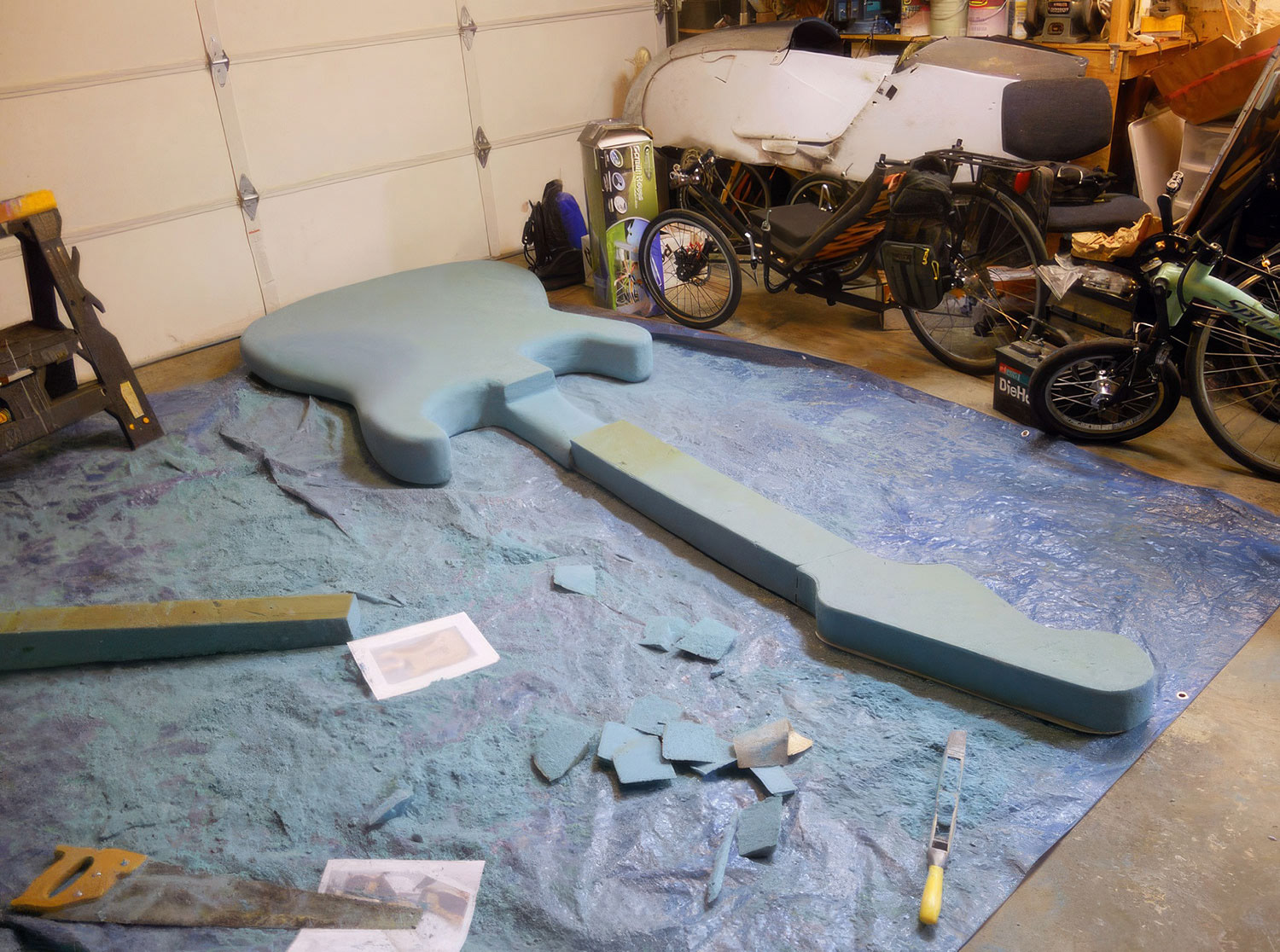 I worked from looking at printouts of my photos. For some reason, Steve didn’t want one of his favorite guitars exposed to a sea of styrofoam dust…