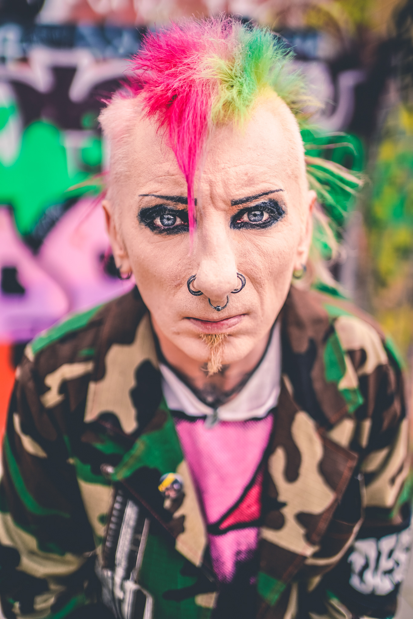 Graham Beano Heenan bass player of punk bands Varukers The Business Texas Terri Bomb Church of Confidence colorful mohawk