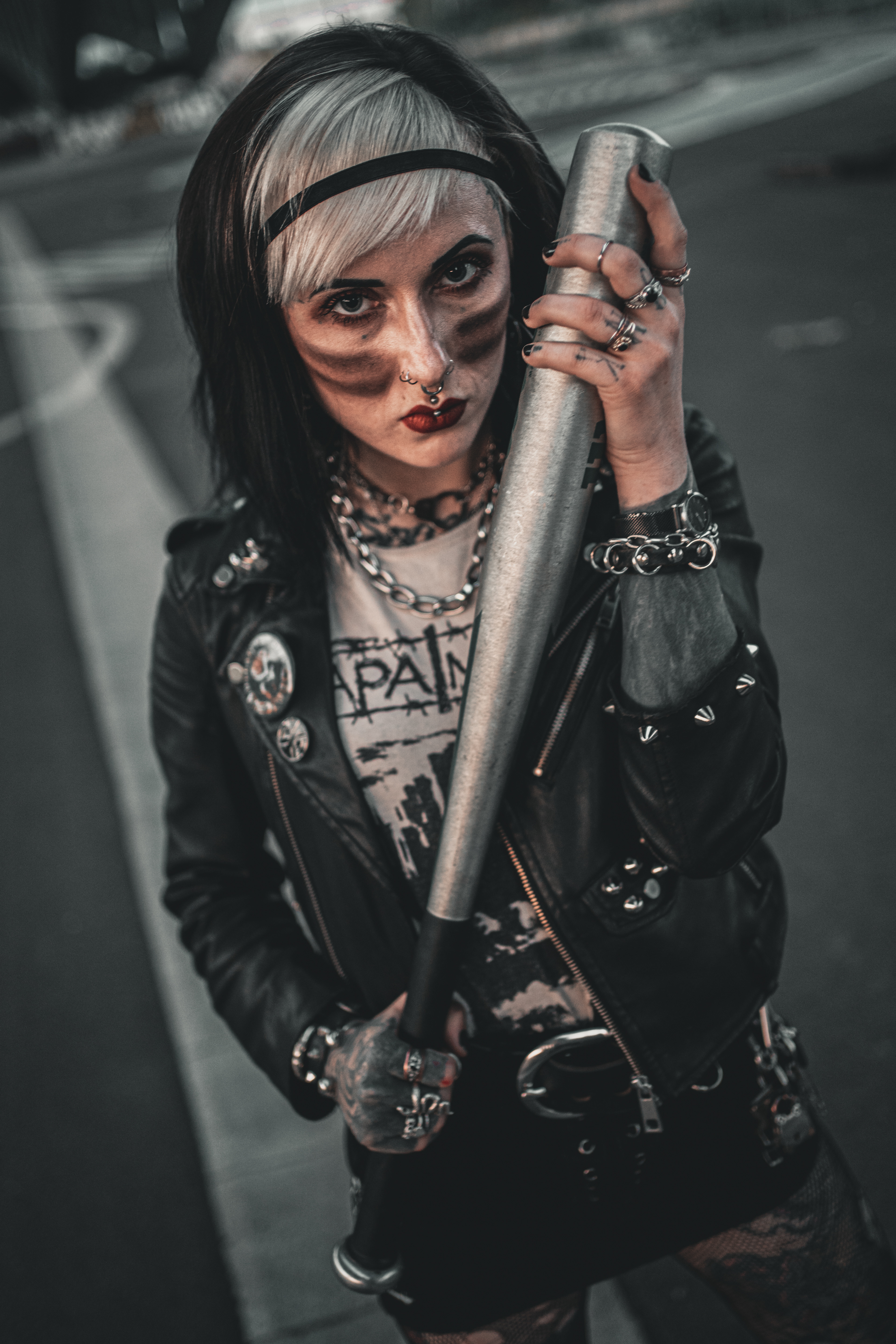 Lina RBL 'War Paint' shot under highway bridge in Berlin holding a baseball bat