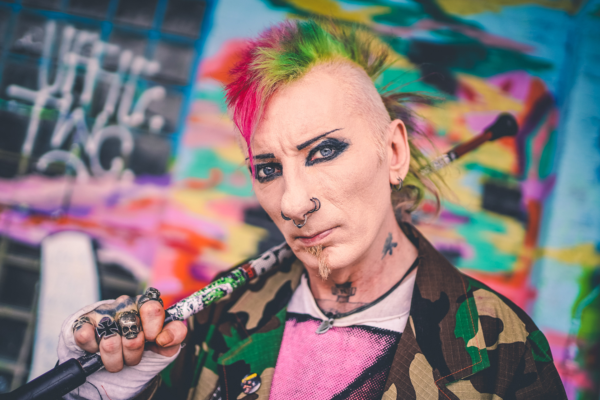 Graham Beano Heenan bass player of punk bands Varukers The Business Texas Terri Bomb Church of Confidence with colorful mohawk