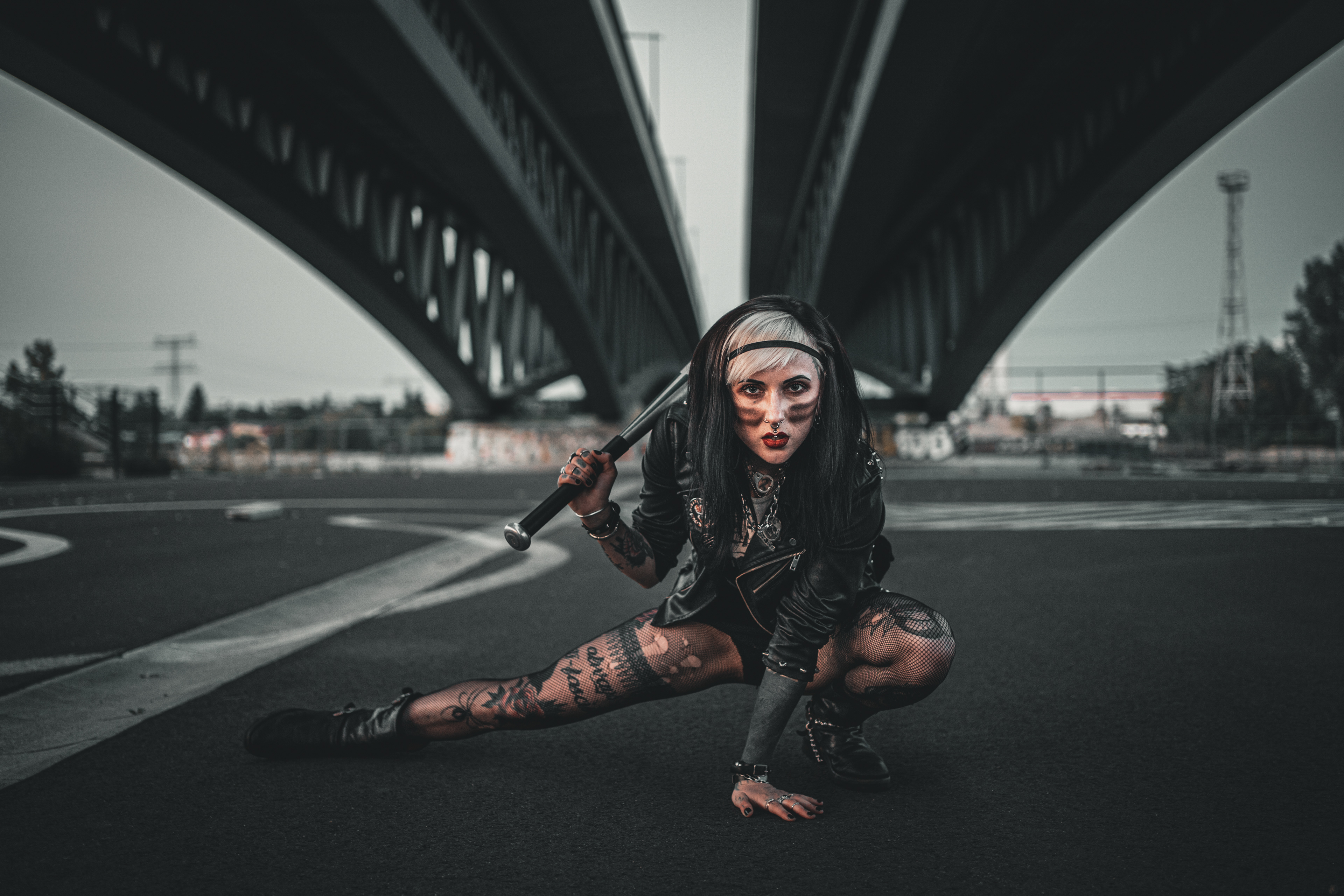 Lina RBL 'The Warrior' shot under highway bridge in Berlin holding a baseball bat