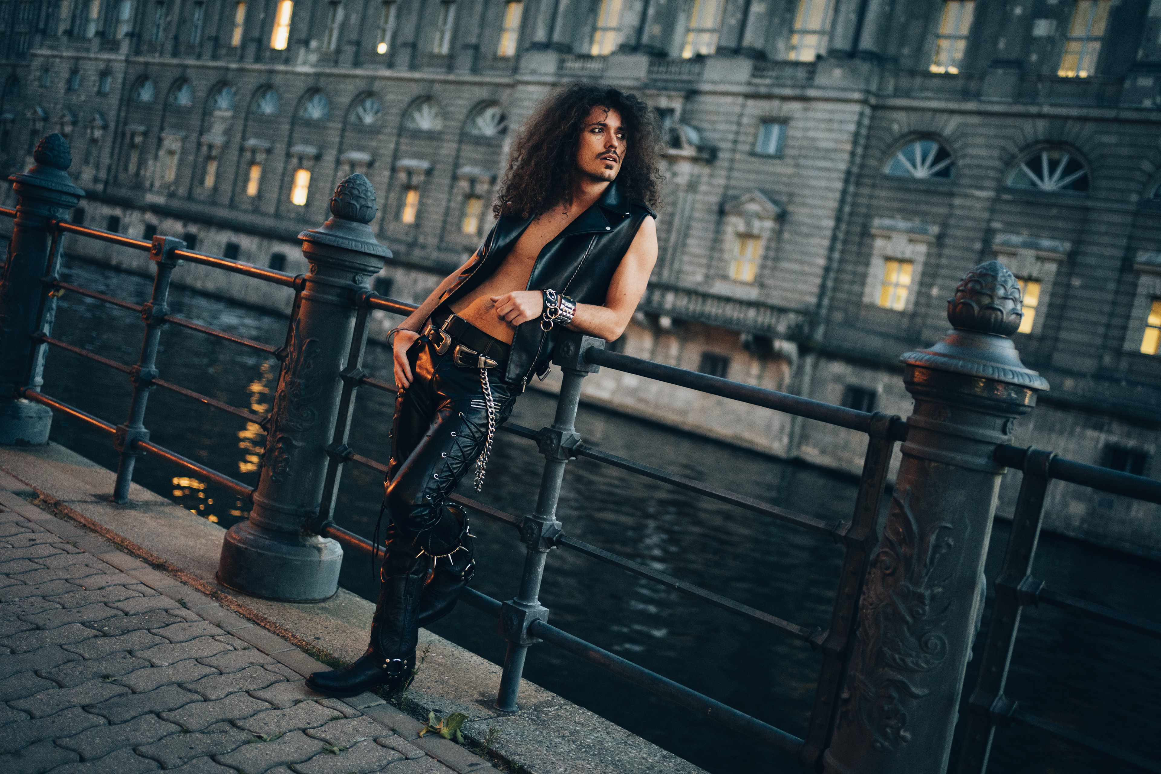 Heiko Musolf guitarist and back vocalist of thrash metal band Rezet standing by a river in Berlin Mitte