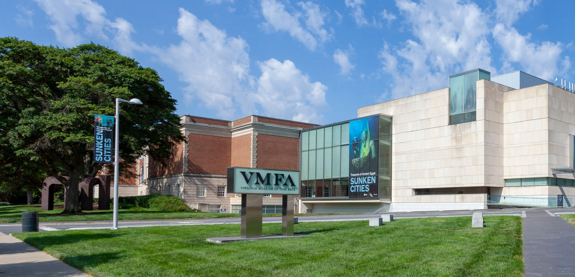 Exterior installation photo, with pole banner and window graphic. Photo: Sandra Sellars © Virginia Museum of Fine Arts.