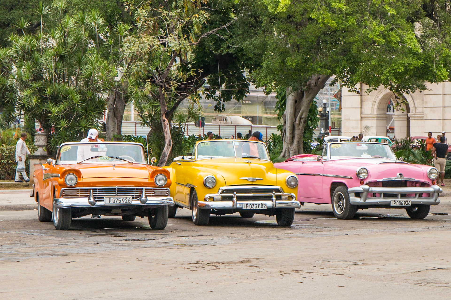 Cuban classic cars ready for tourists at Parque Central in Havana, Cuba