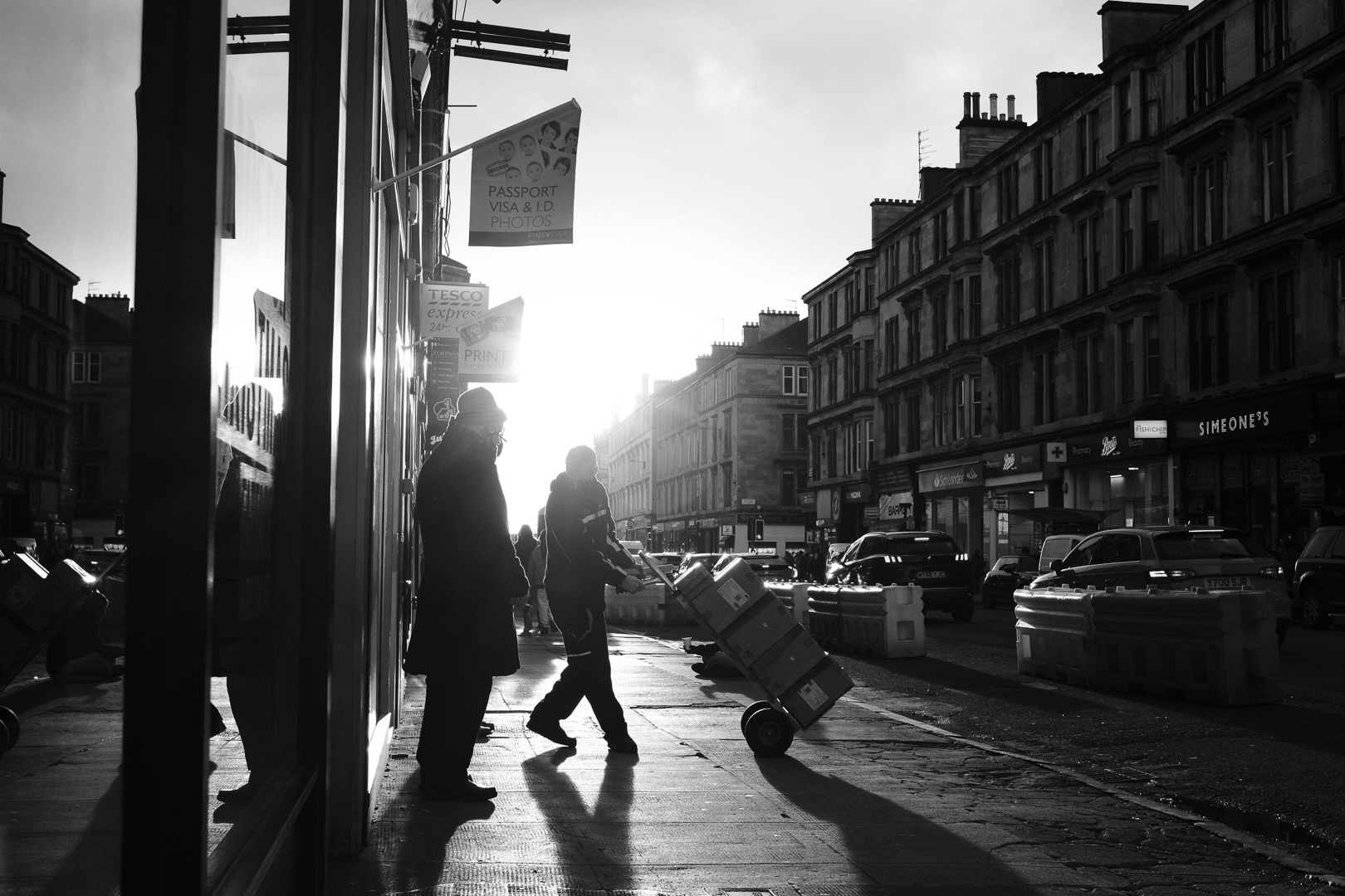 Deliveries on route in the winters high sun on Byres Road.