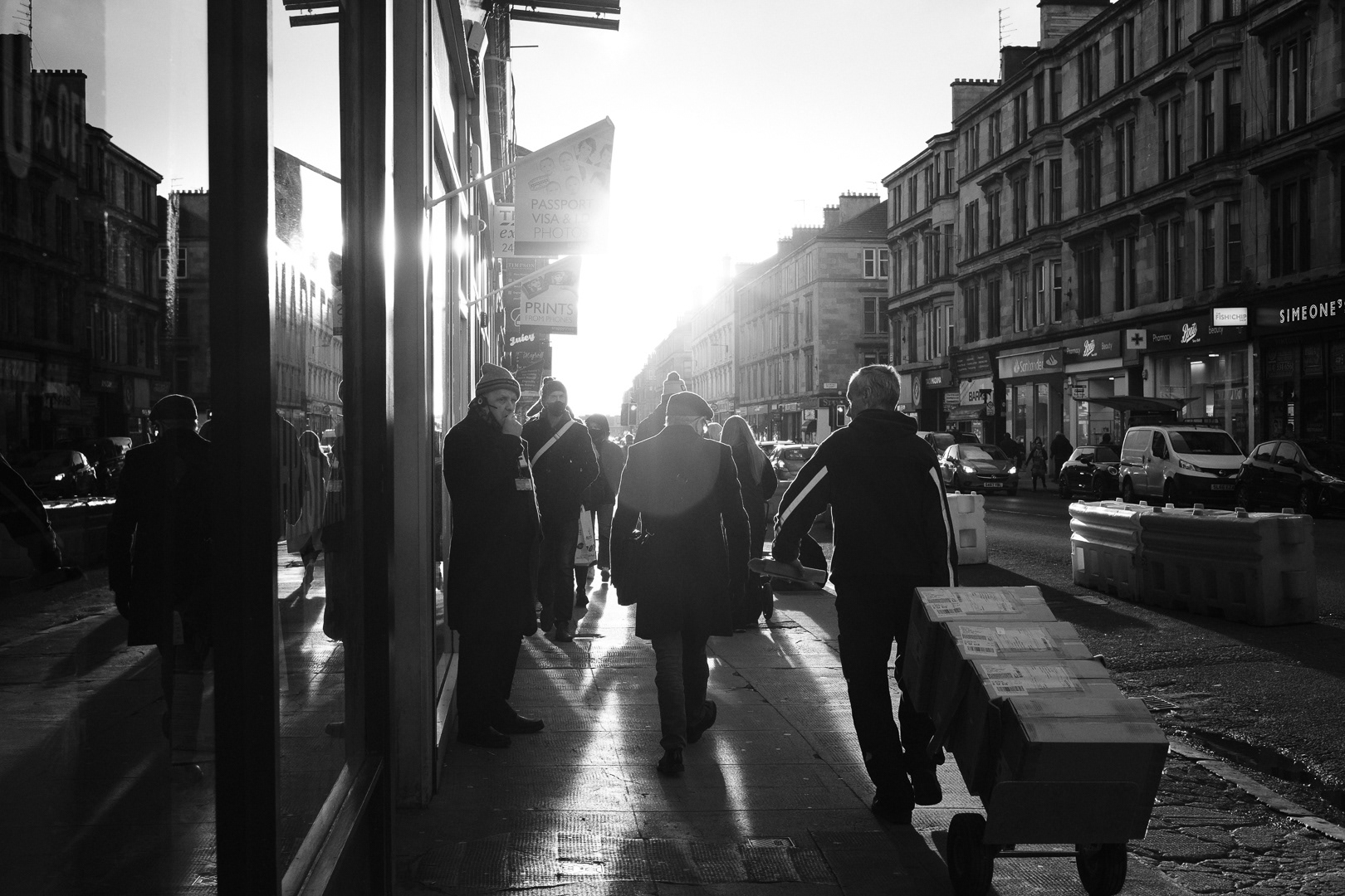 Deliveries on route in the winters high sun on Byres Road.