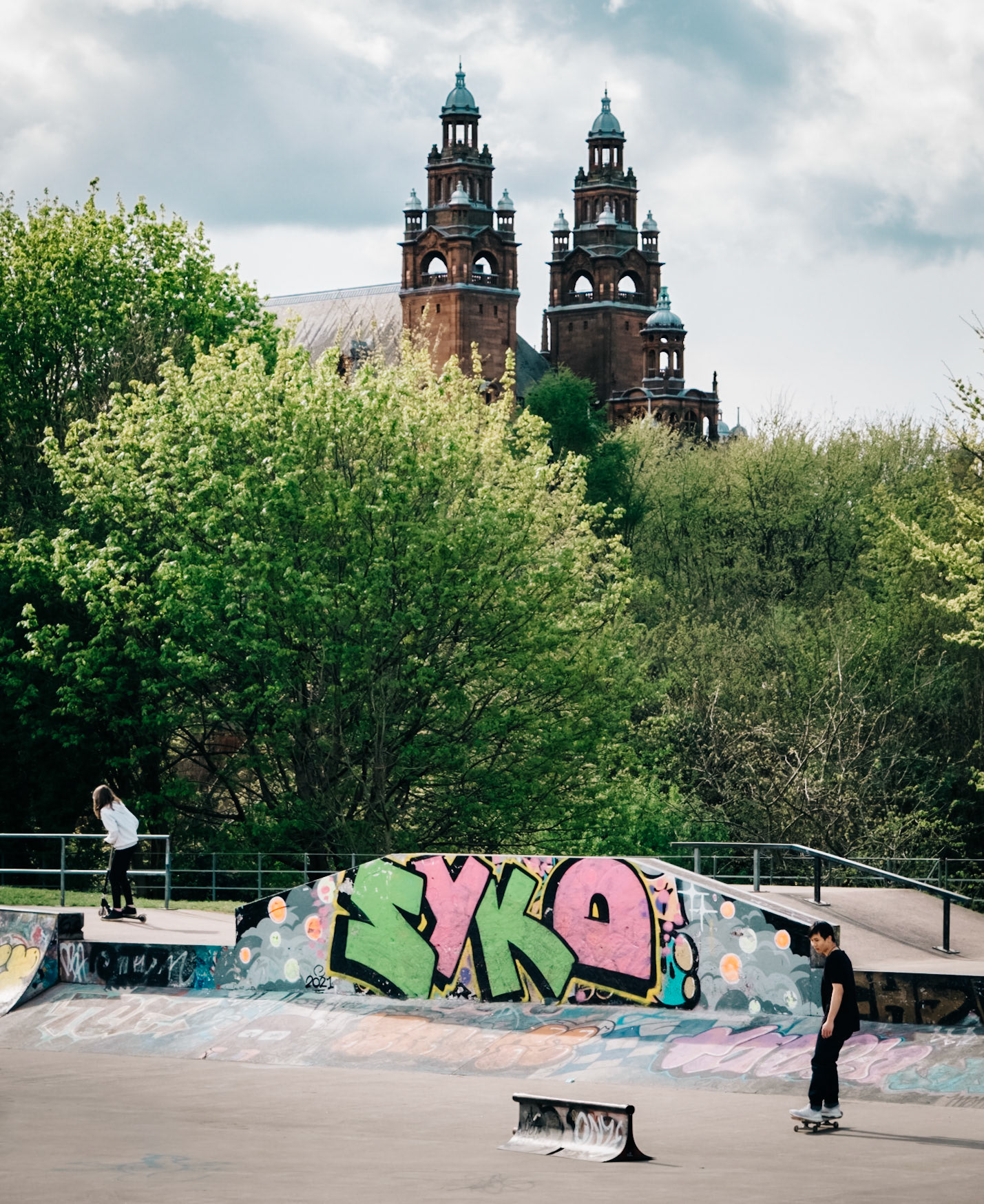 Skate boarder 1 - Taking it easy. I love the composition with Glasgow University in the background and the Art work in the Skate Park.