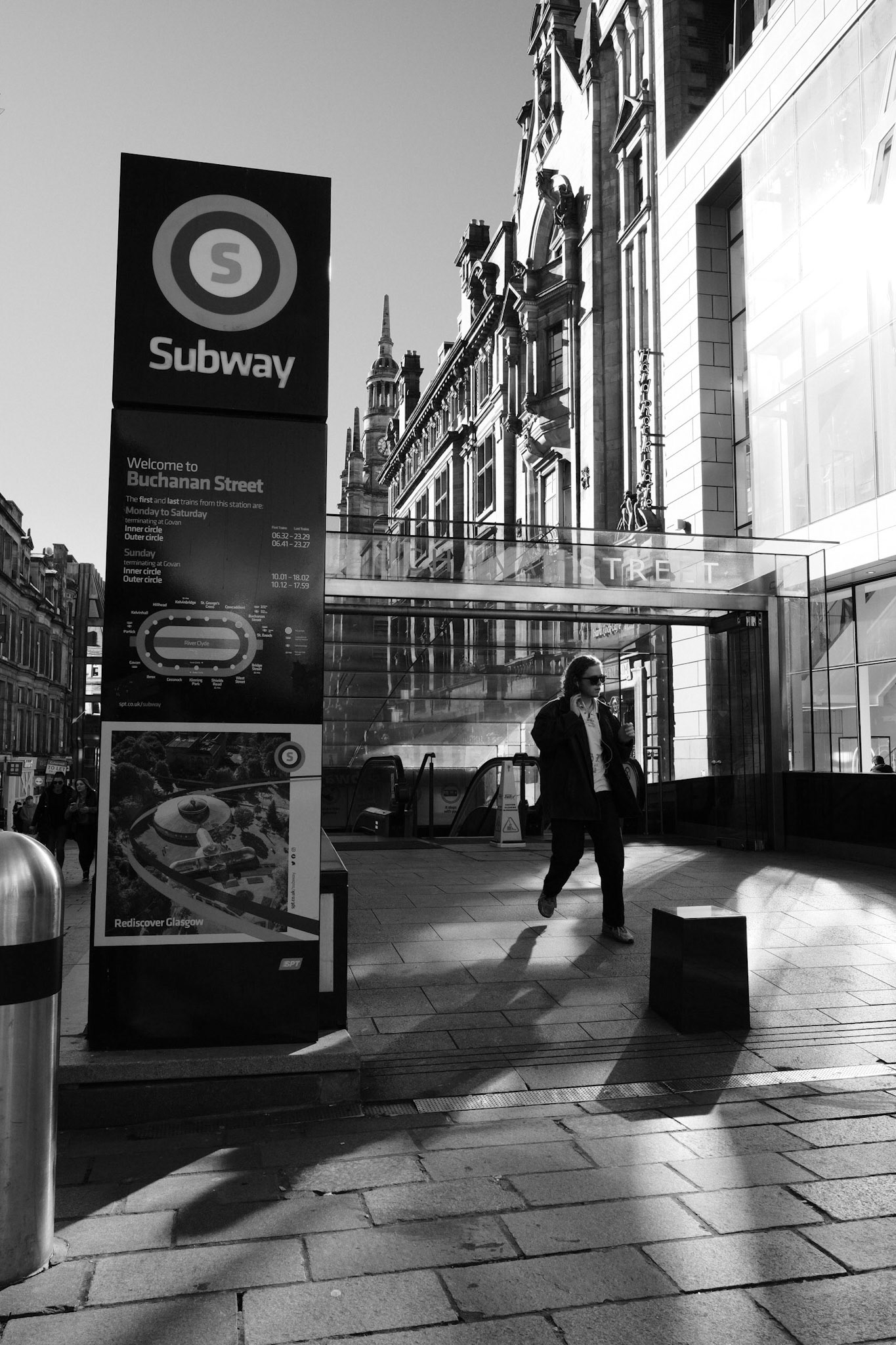 Young guy working the shadows at Buchanan Subway station