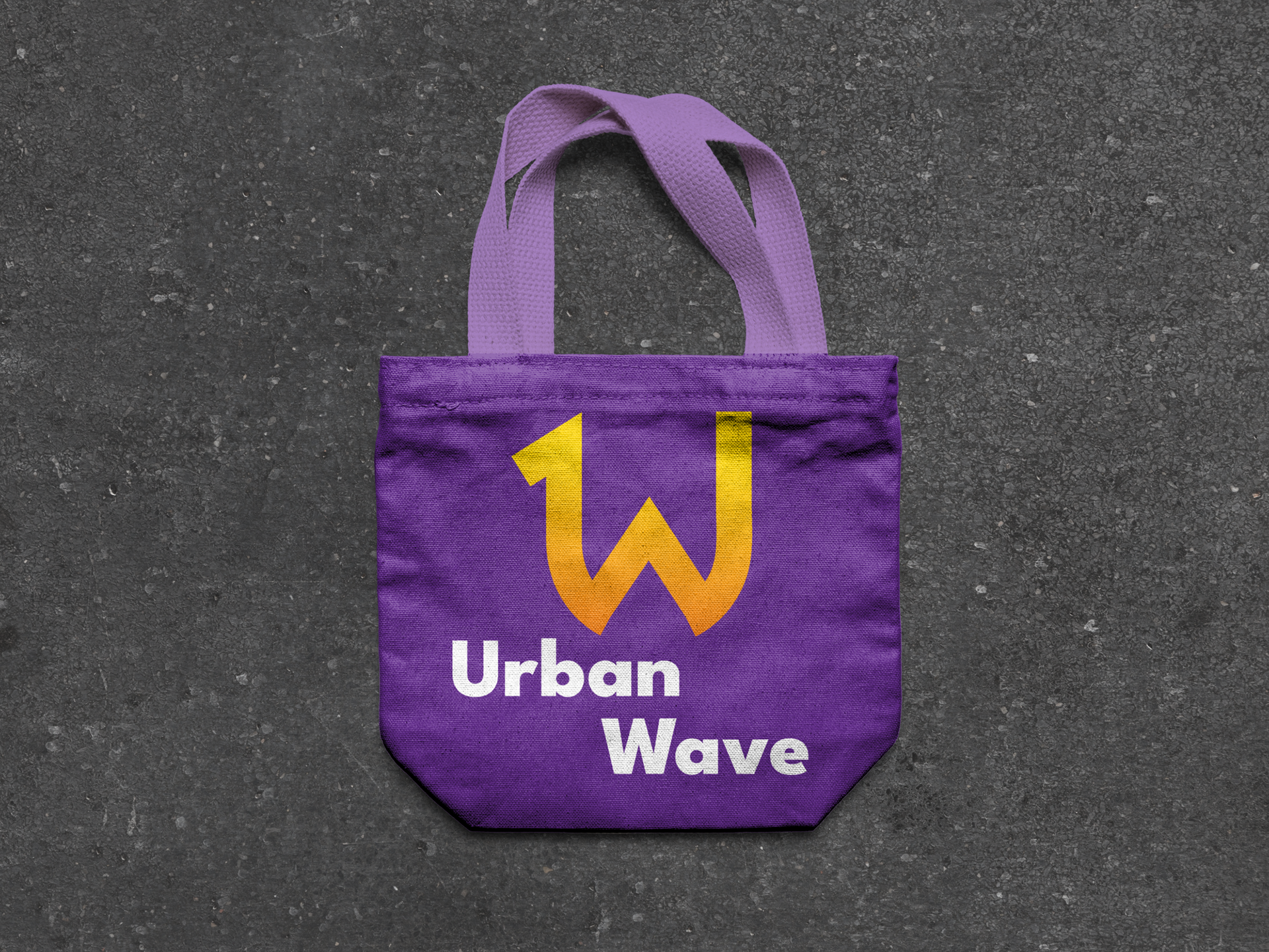 A mockup showing Urban Wave's logo printed on a tote bag.