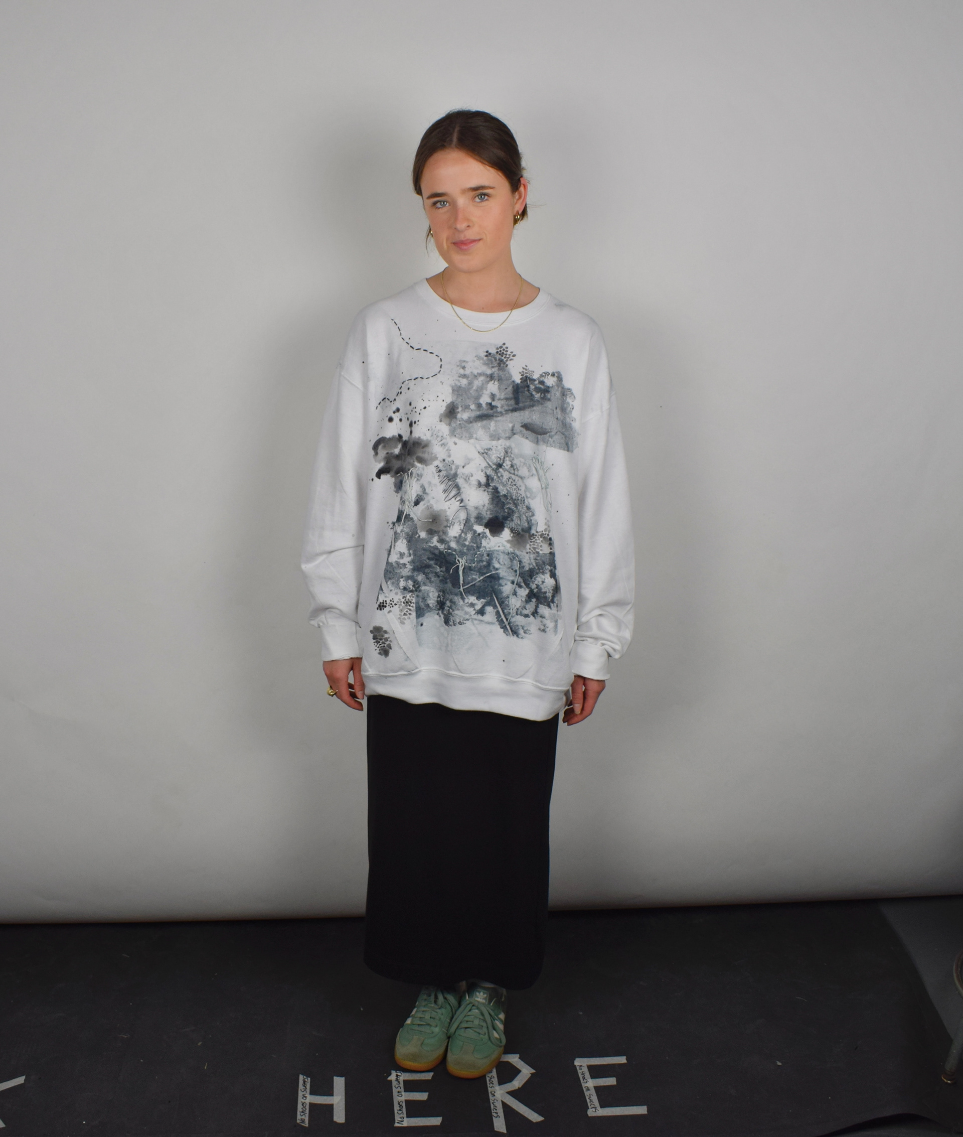 Me with the sweatshirt I designed in my printmaking class!