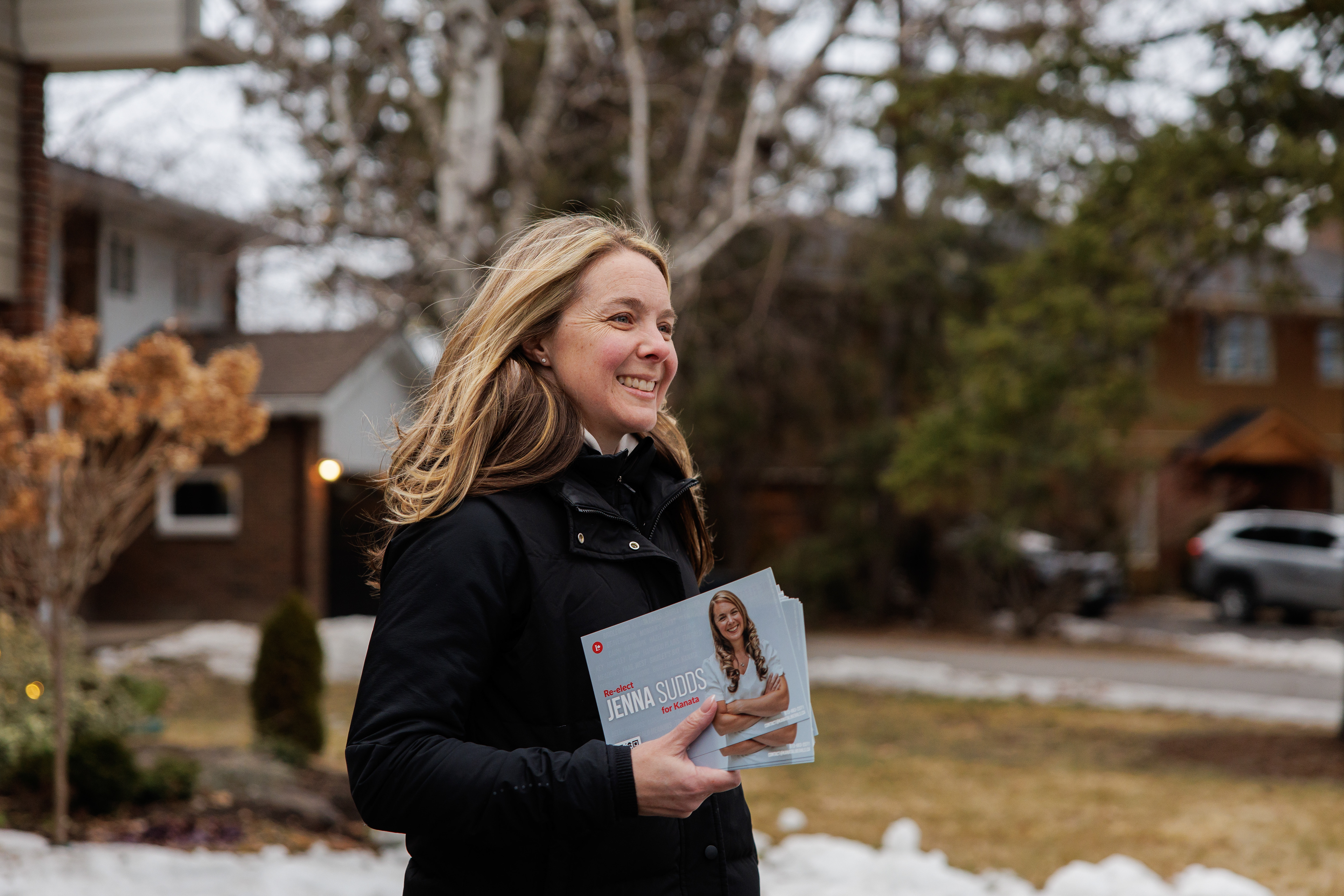 Crouched on the ground of a stranger's driveway, I surprised Jenna as she finished up a conversation with a neighbour at their doorstep.