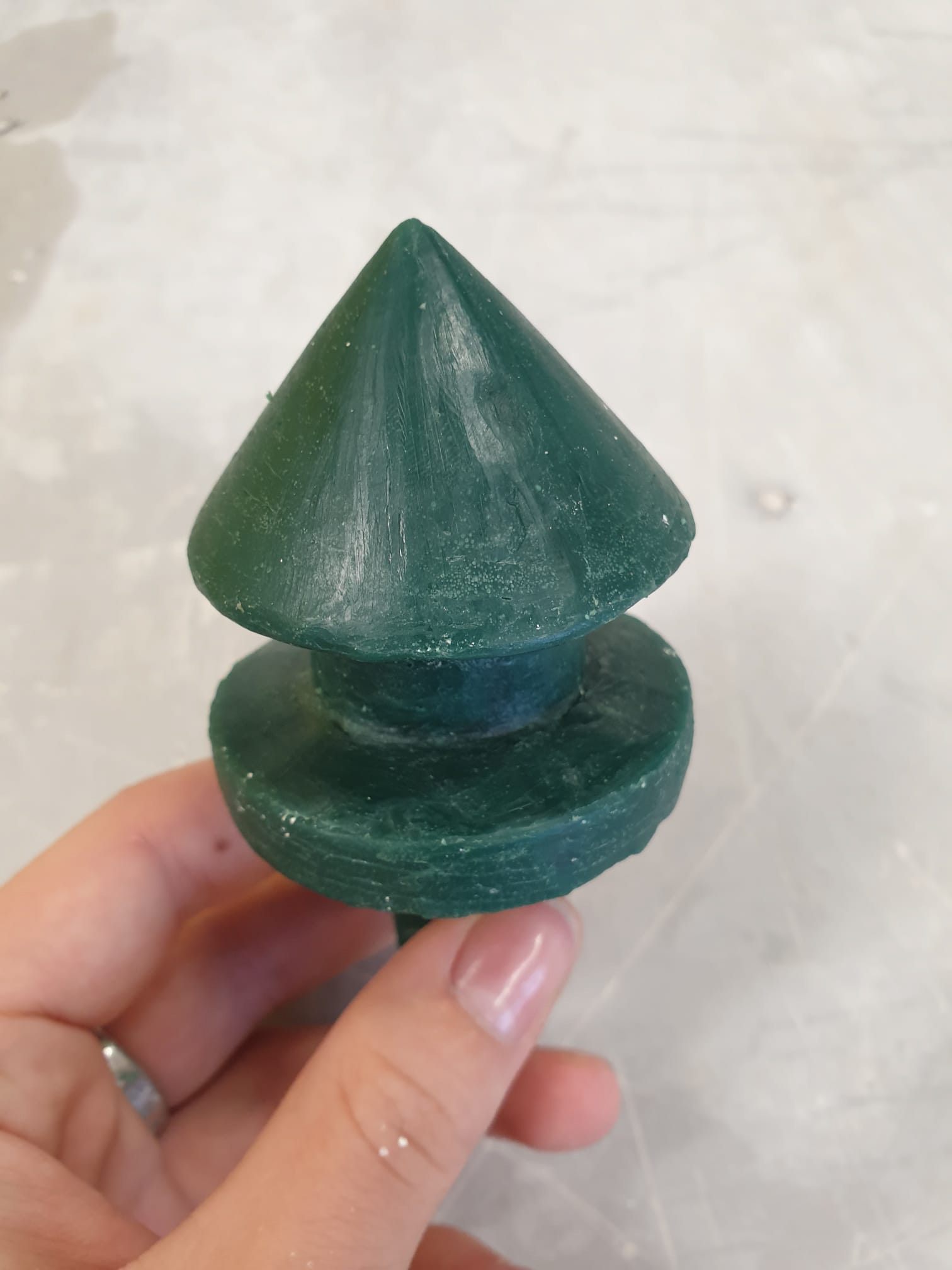 The wax cast, made from the 2 part mold.
