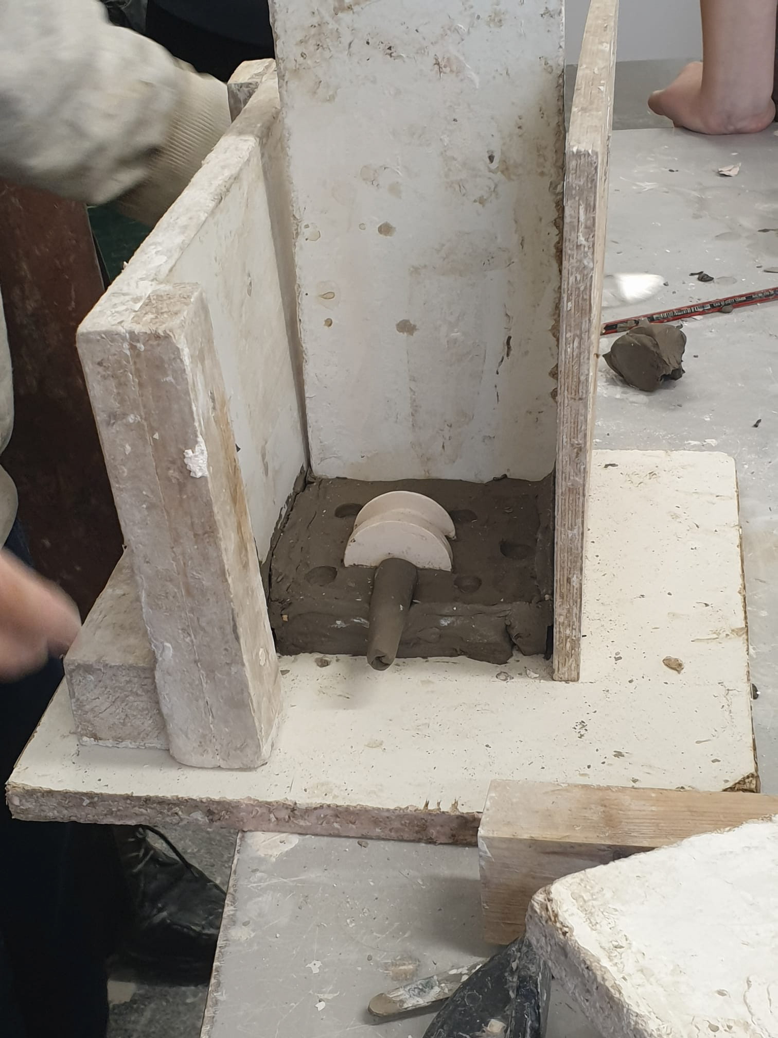 Making a 2 part mold from the turned plaster piece.