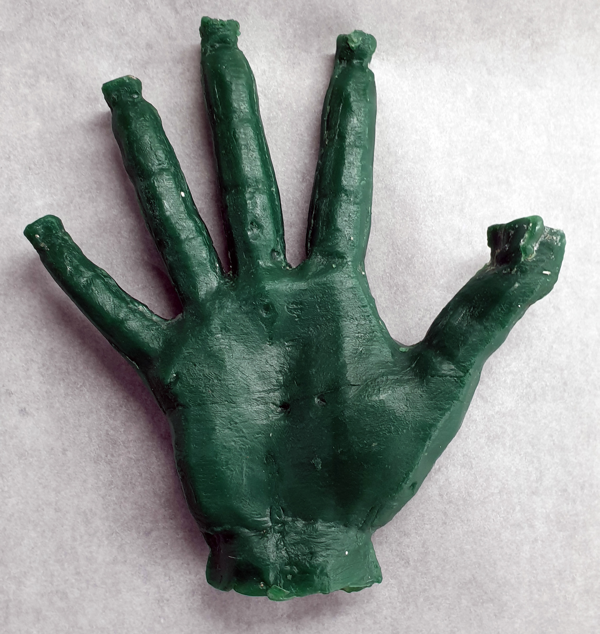Finishing a wax casted hand from a 2 sided mold