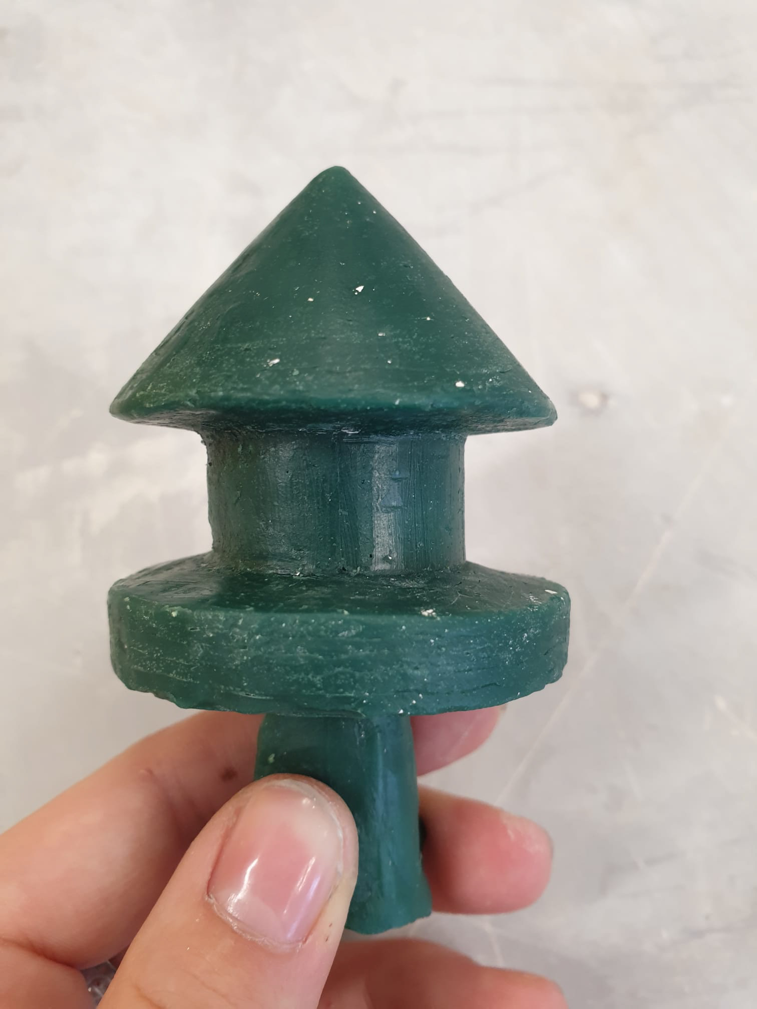 The wax cast, made from the 2 part mold.