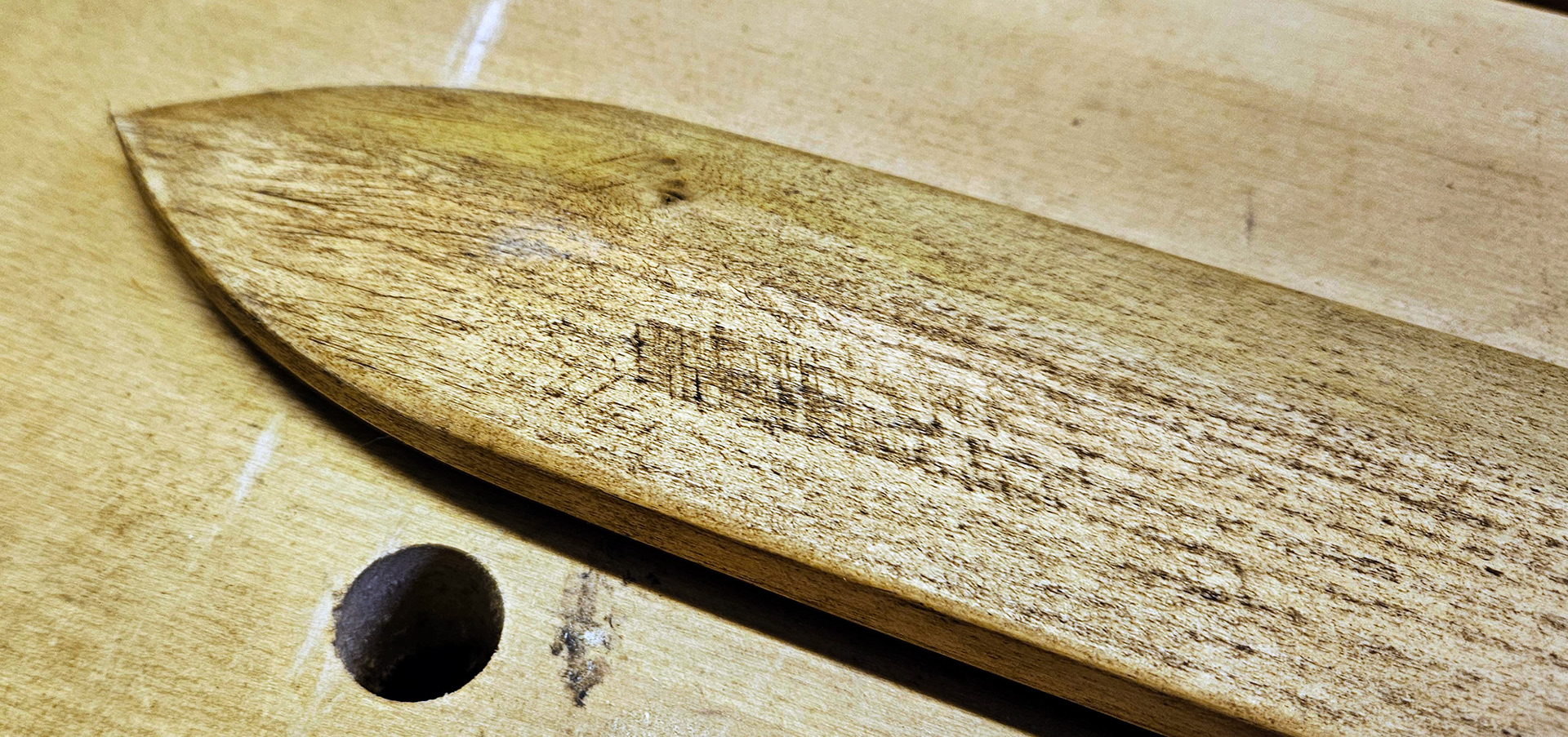 Close-up of blade point & stain effect
