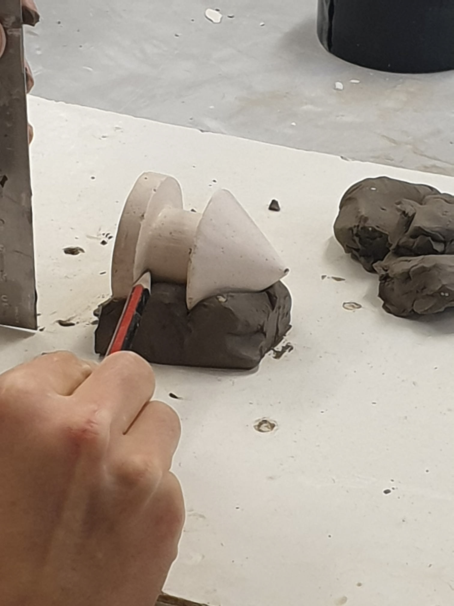 Making a 2 part mold from the turned plaster piece.