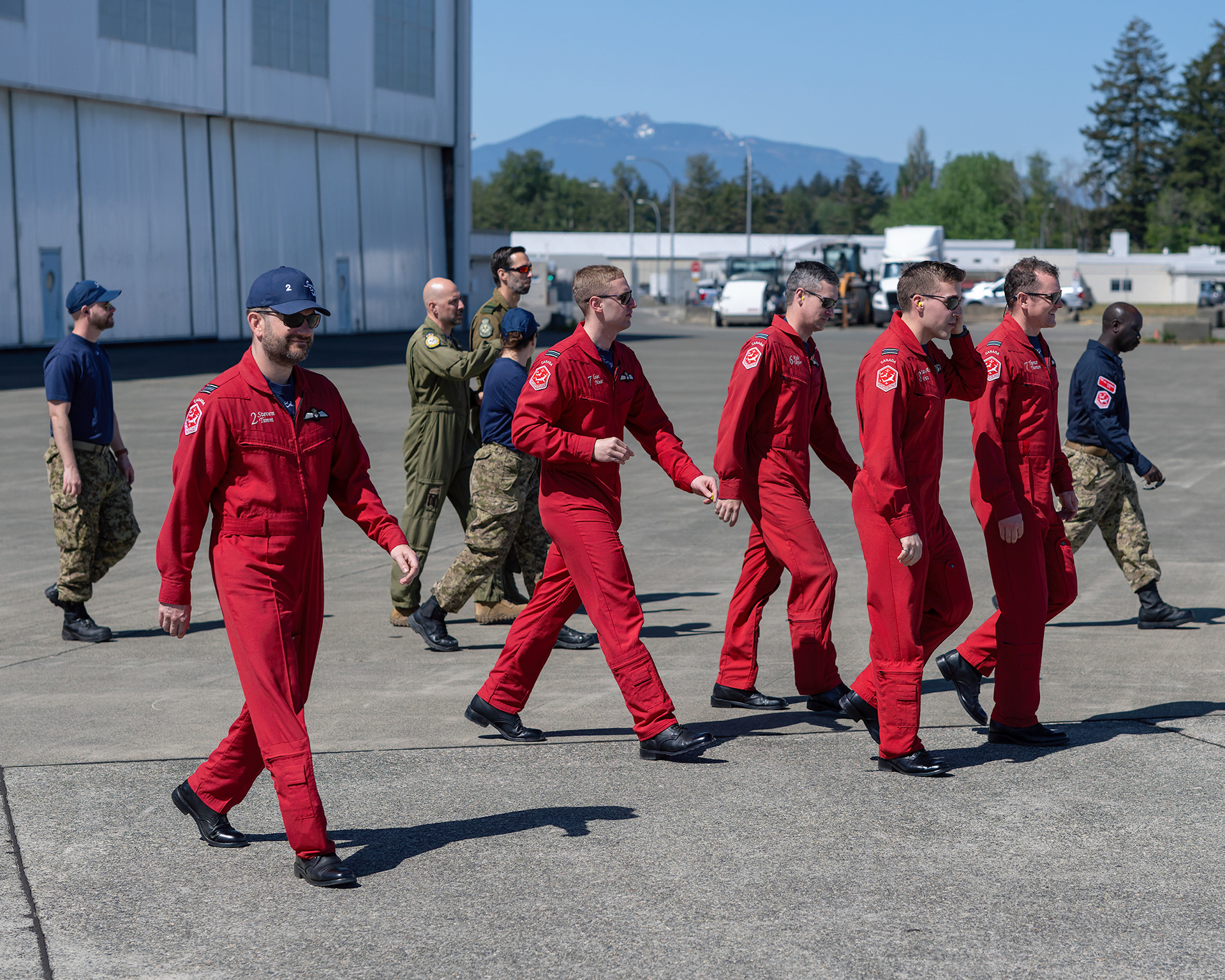 Canadian Forces Snowbirds pilots walking out to the flight line during their annual spring training sessions at CFB Comox, British Columbia. Fine art aviation lifestyle photography by Kevin Prentice.