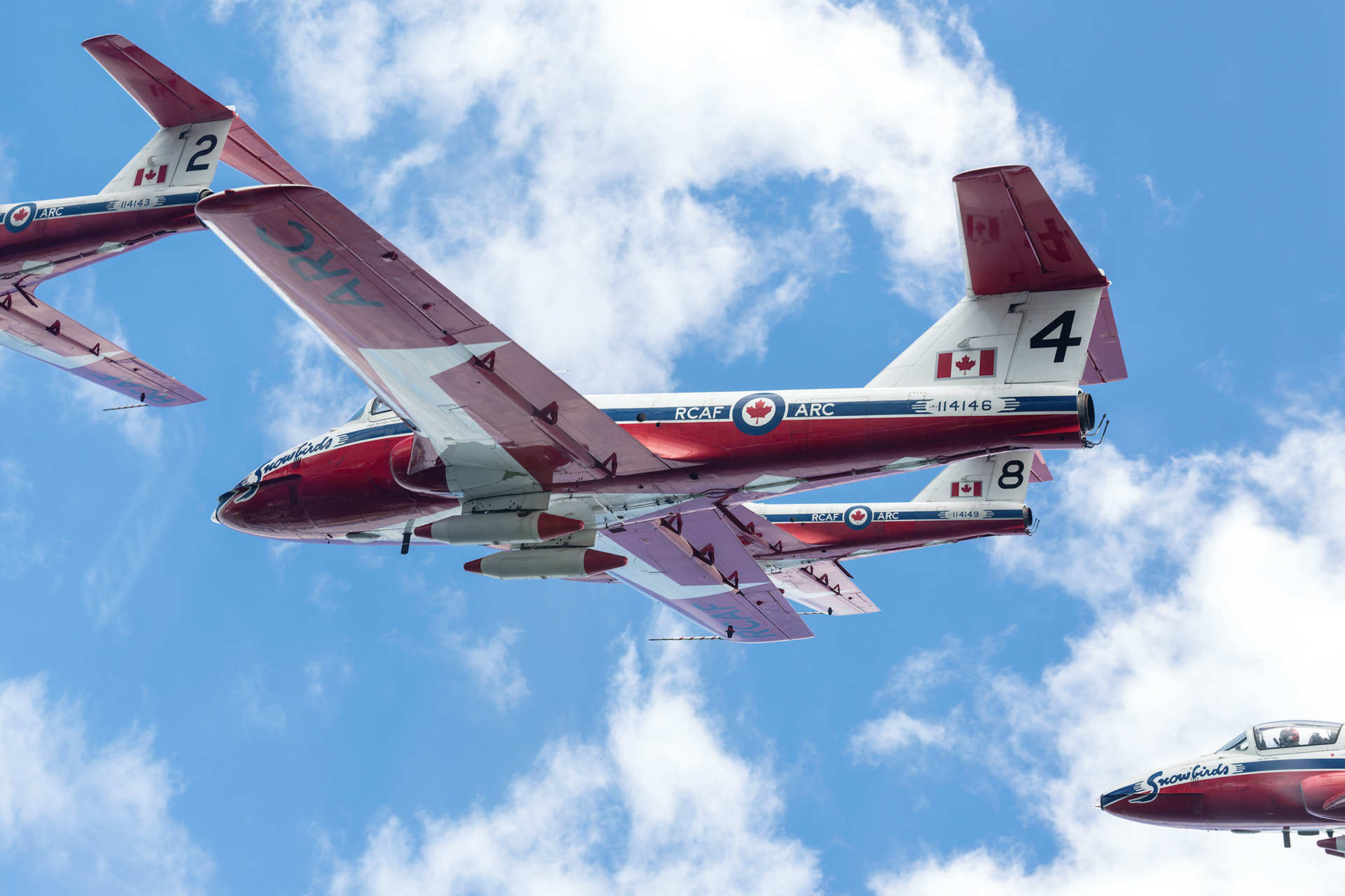 Snowbirds in Tight Formation | CT-114 Tutor Jets Against Blue Sky. Aviation Photography by Kevin Prentice