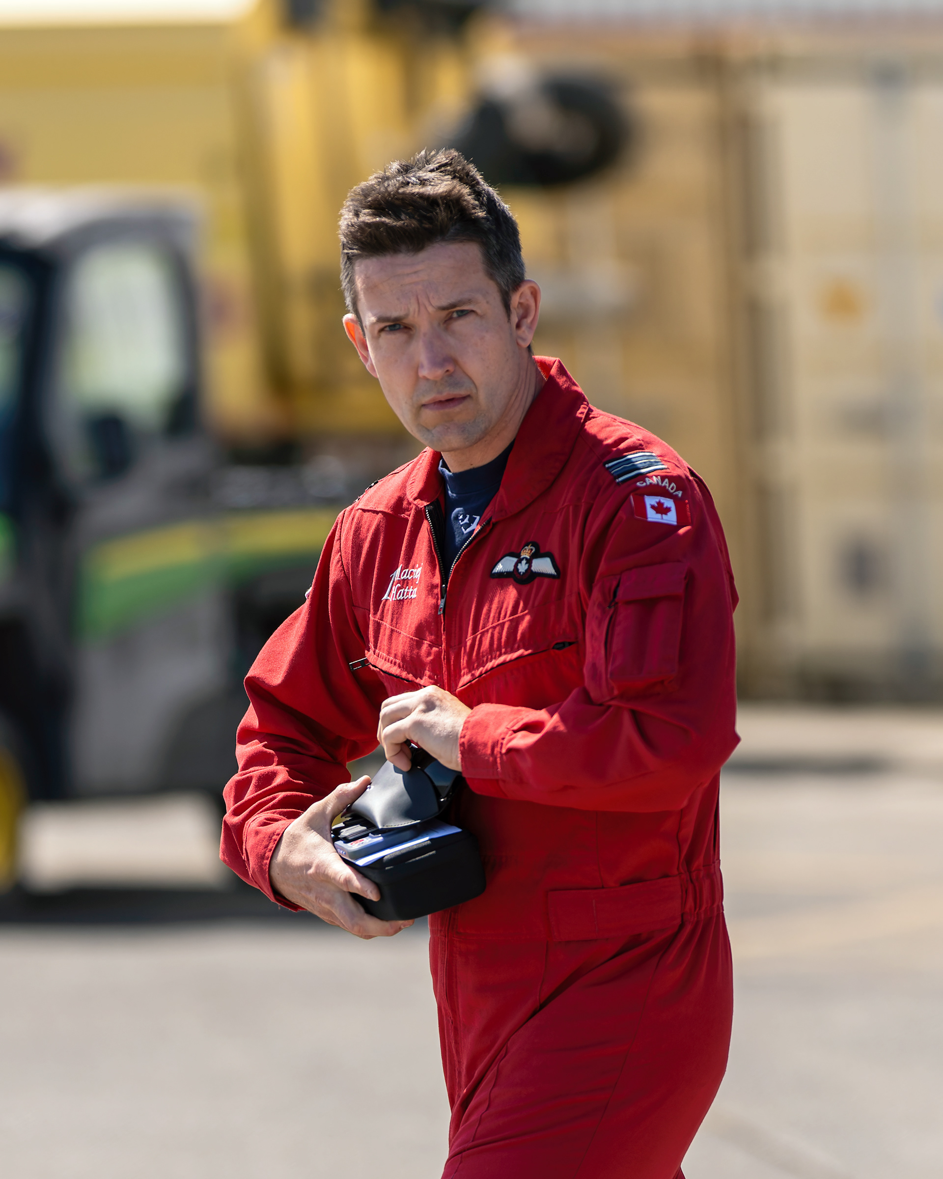 Snowbird 1, Team Lead Major Maciej Hatta, walks toward his CT-114 Tutor jet to prepare for a training mission during the 2026 spring training deployment at CFB Comox, British Columbia.