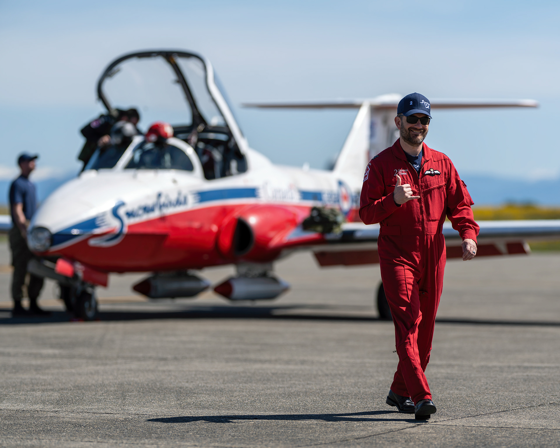 Snowbird 2, pilot Major Steve Timm, walks the flight line at 19 Wing Comox to prepare for a training sortie during the 2026 spring training deployment in British Columbia. Fine art aviation photography by Kevin Prentice.