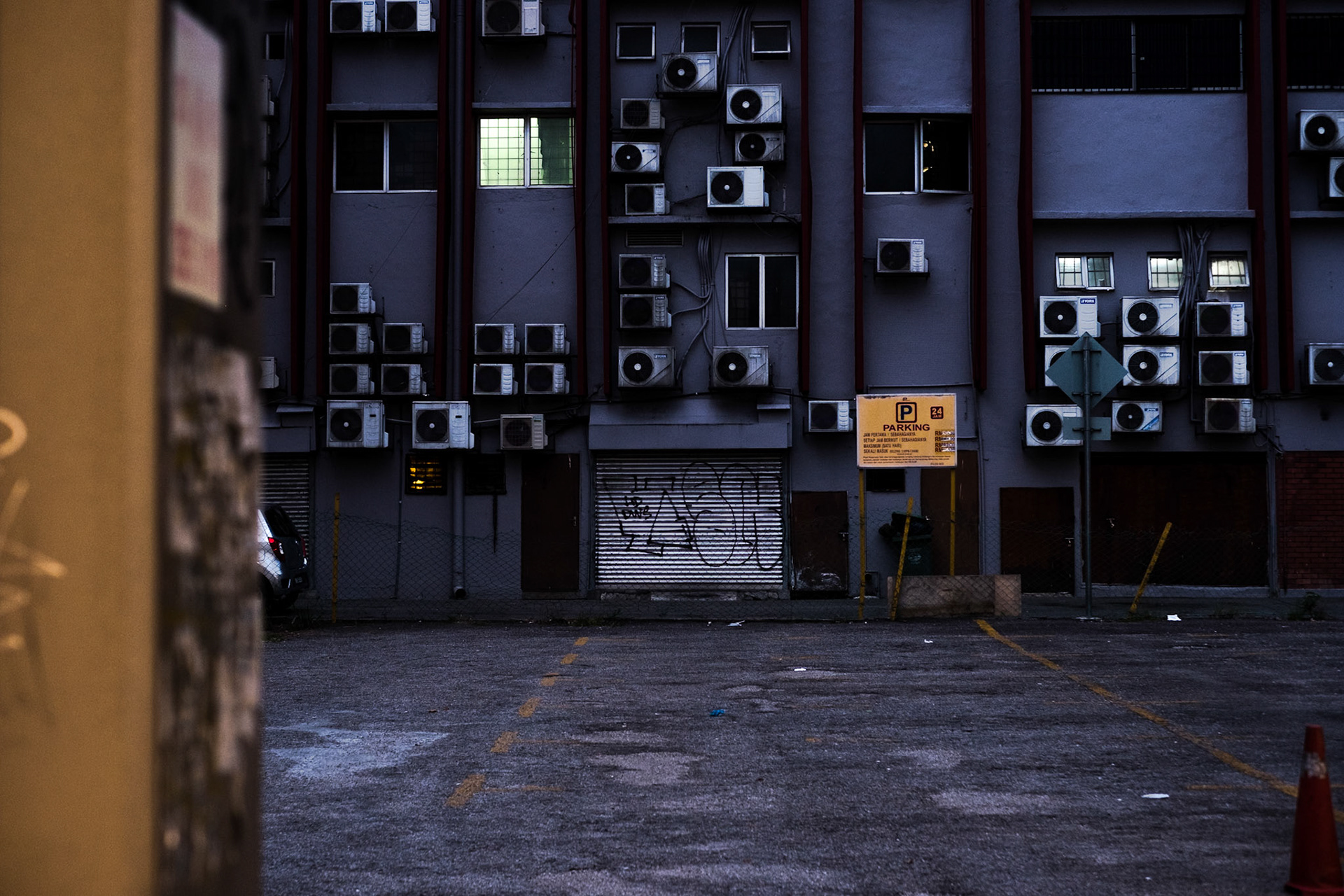 Revisiting Kuala Lumpur III. A whole lot of a/c's.  Also, love this color pallette. I walked by this building a lot, as it was very near to the hostel I was working/staying at. Another photo I took on my first night in the city.