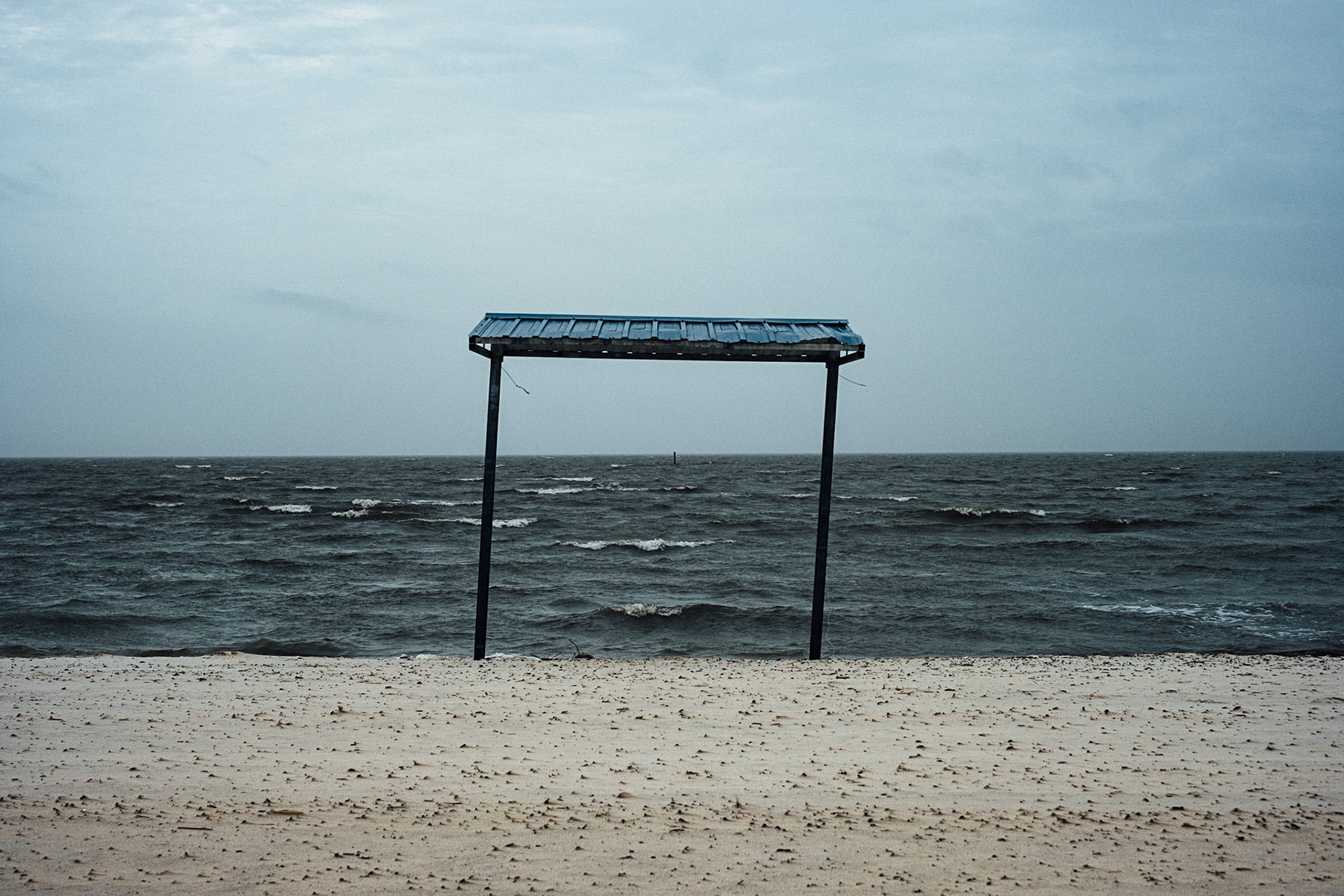 (Mostly) Bicycling America XXXIII. Rough Seas and a Random Beach Somewhere Along the Coast of Mississippi While on my Way to New Orleans. Nothing but the eternal here.