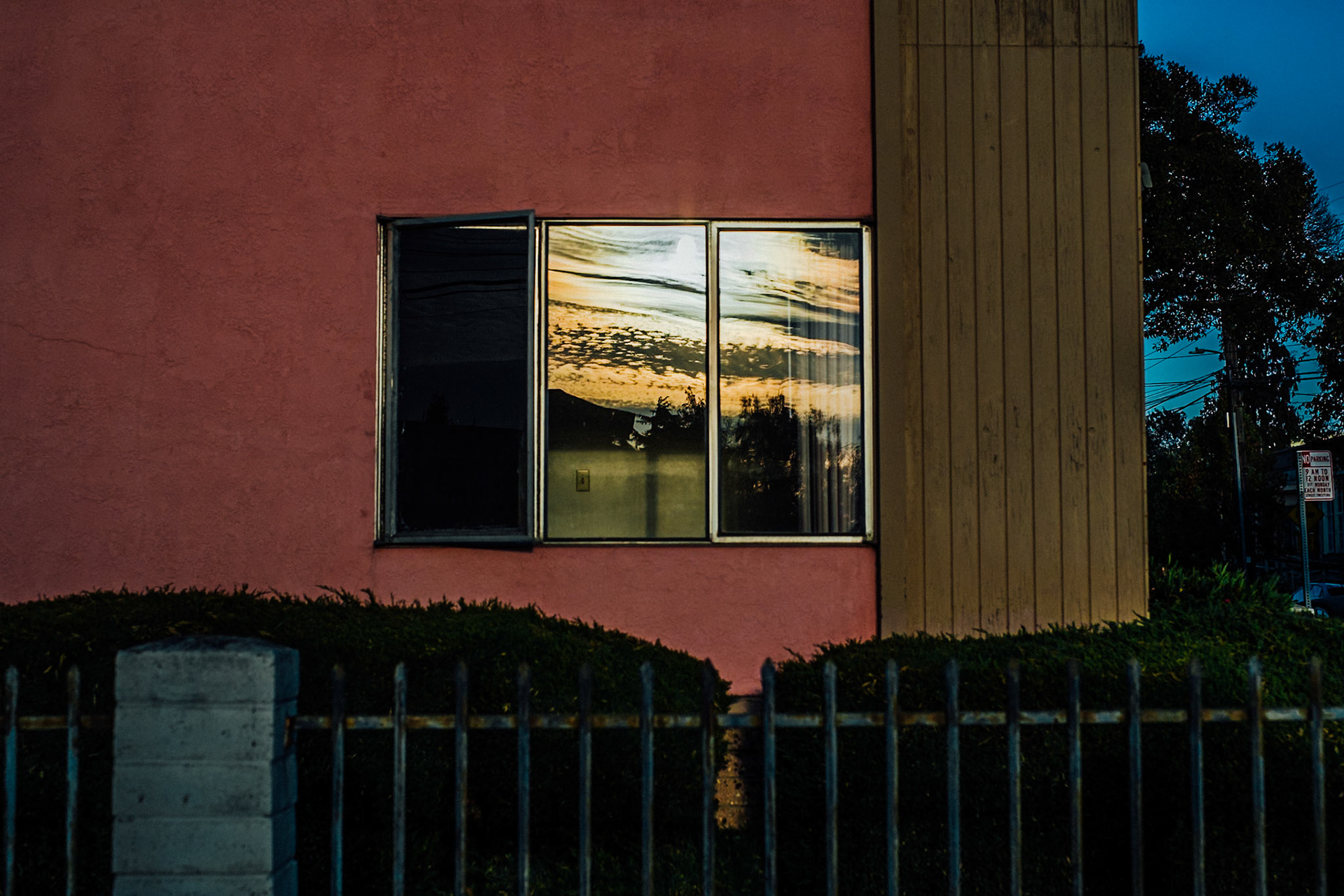 Sunset Reflected in a Window