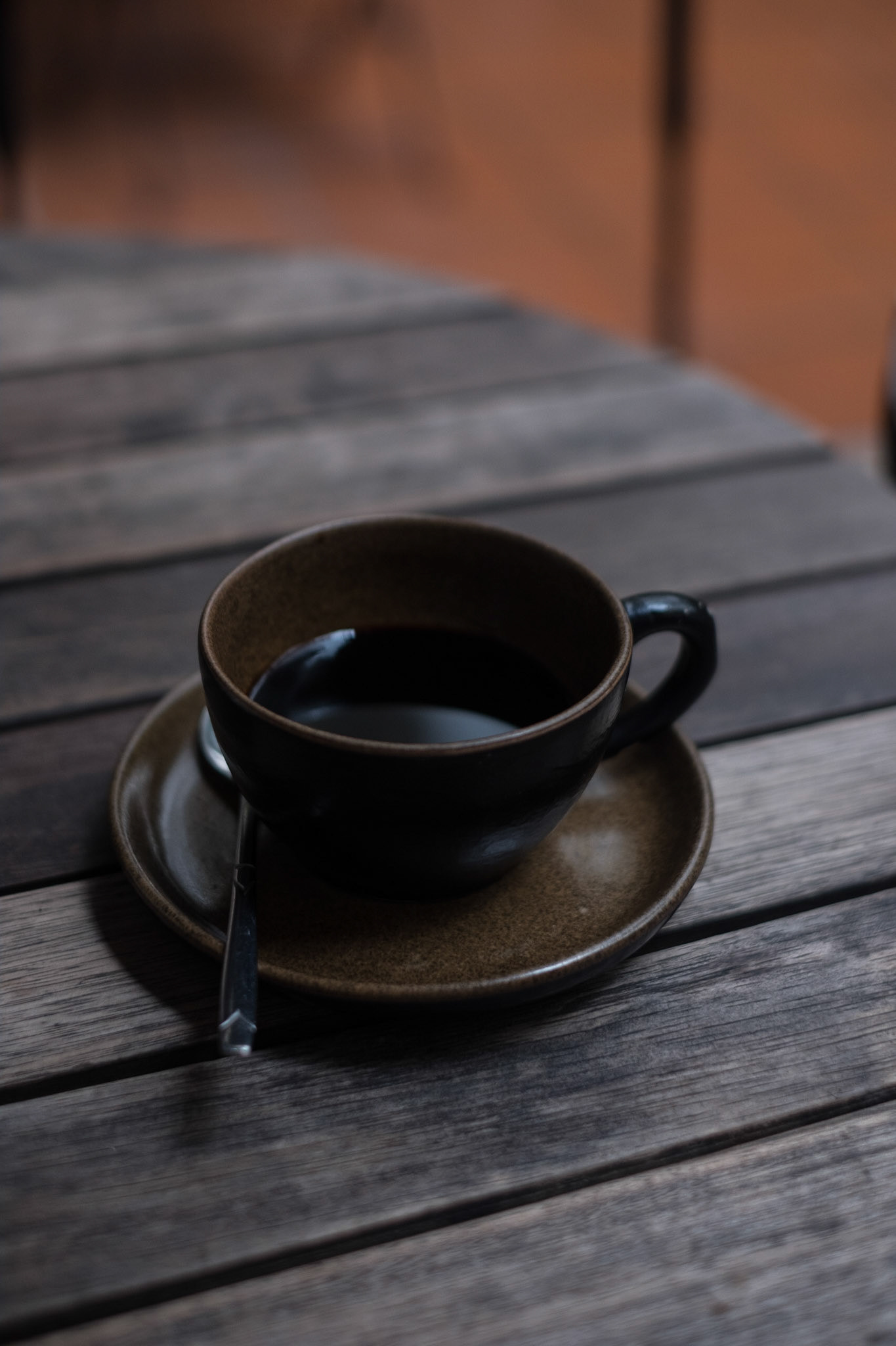 Coffees in Vietnam VI. Black Vietnamese coffee at Hanoi Sandwich House. The first meal I had in Hanoi, and in all Vietnam, was here—just a vegetarian banh mi that was quite good, if expensive relative to bahn mi elsewhere in the city, and an americano. The sandwich shop was next door to the apartment I was to temporarily stay in before moving to the apartment I would be for the remainder of the month in Hanoi.